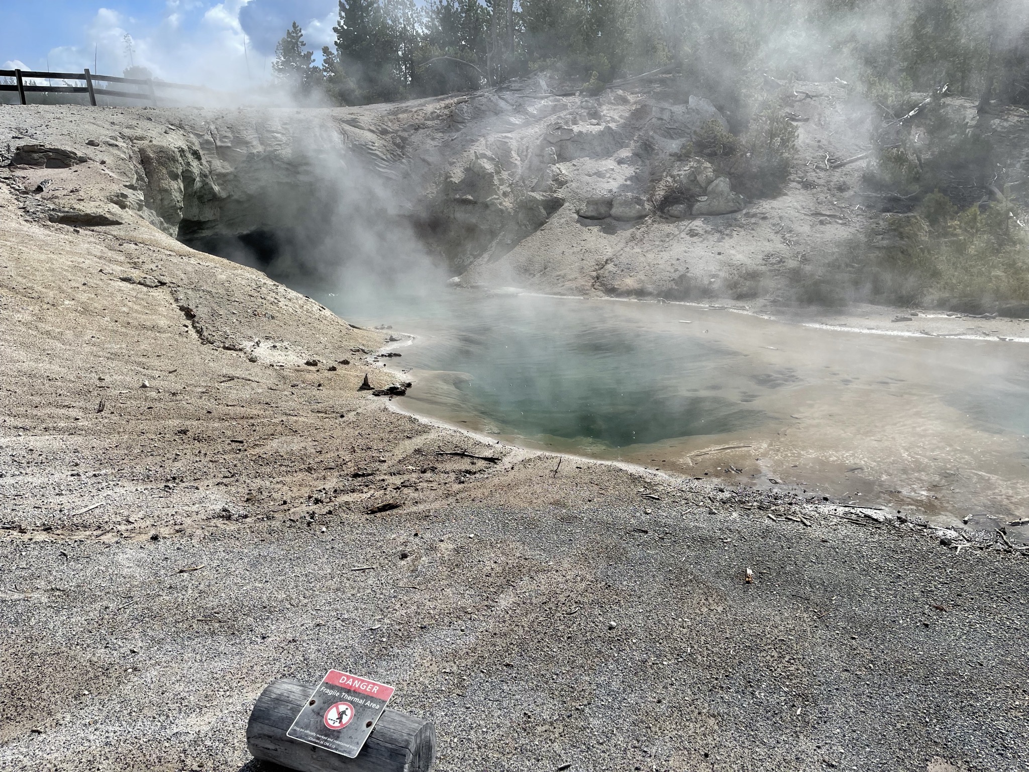 Steamy pool and cave