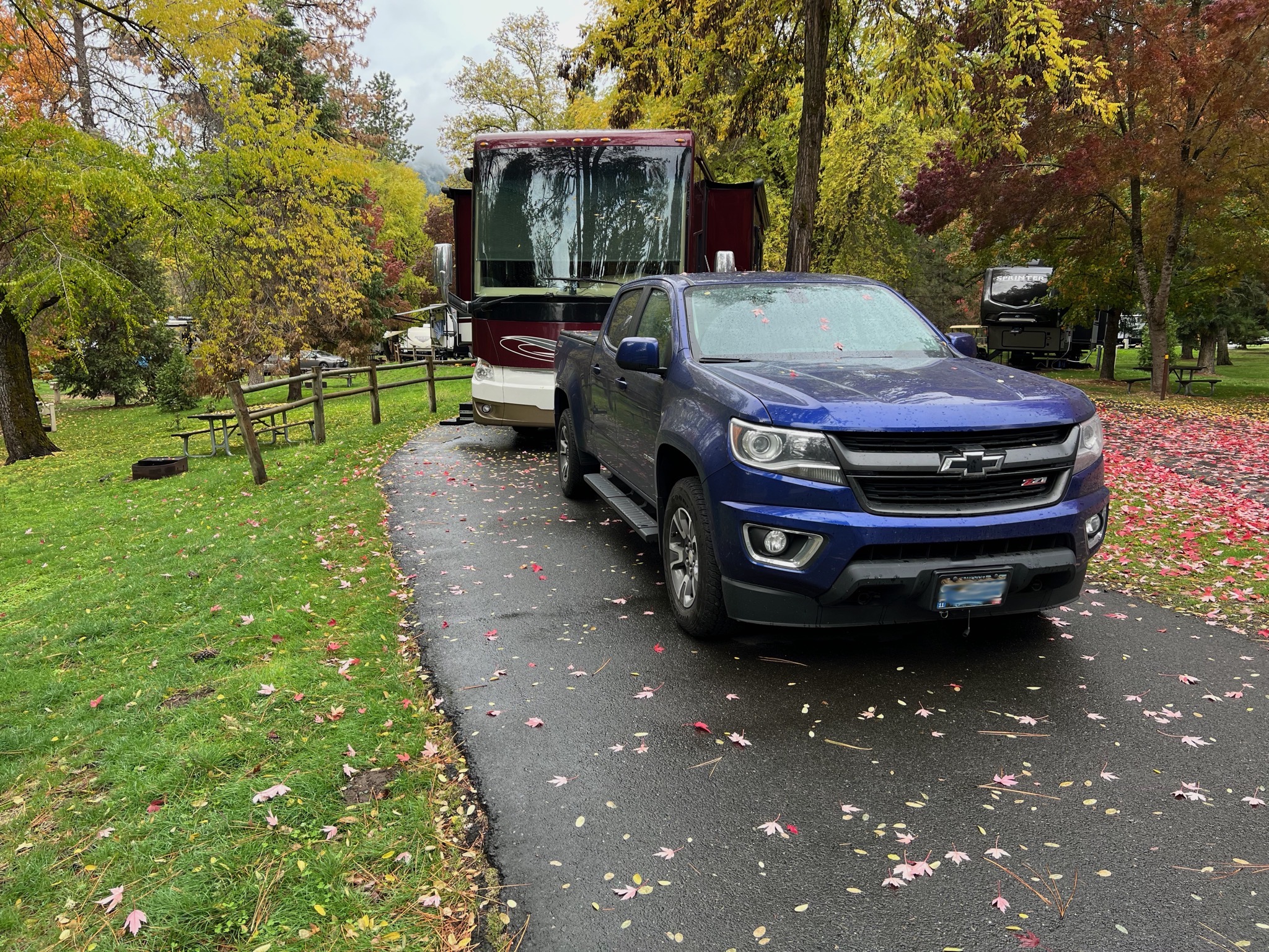 Truck and coach in campsite