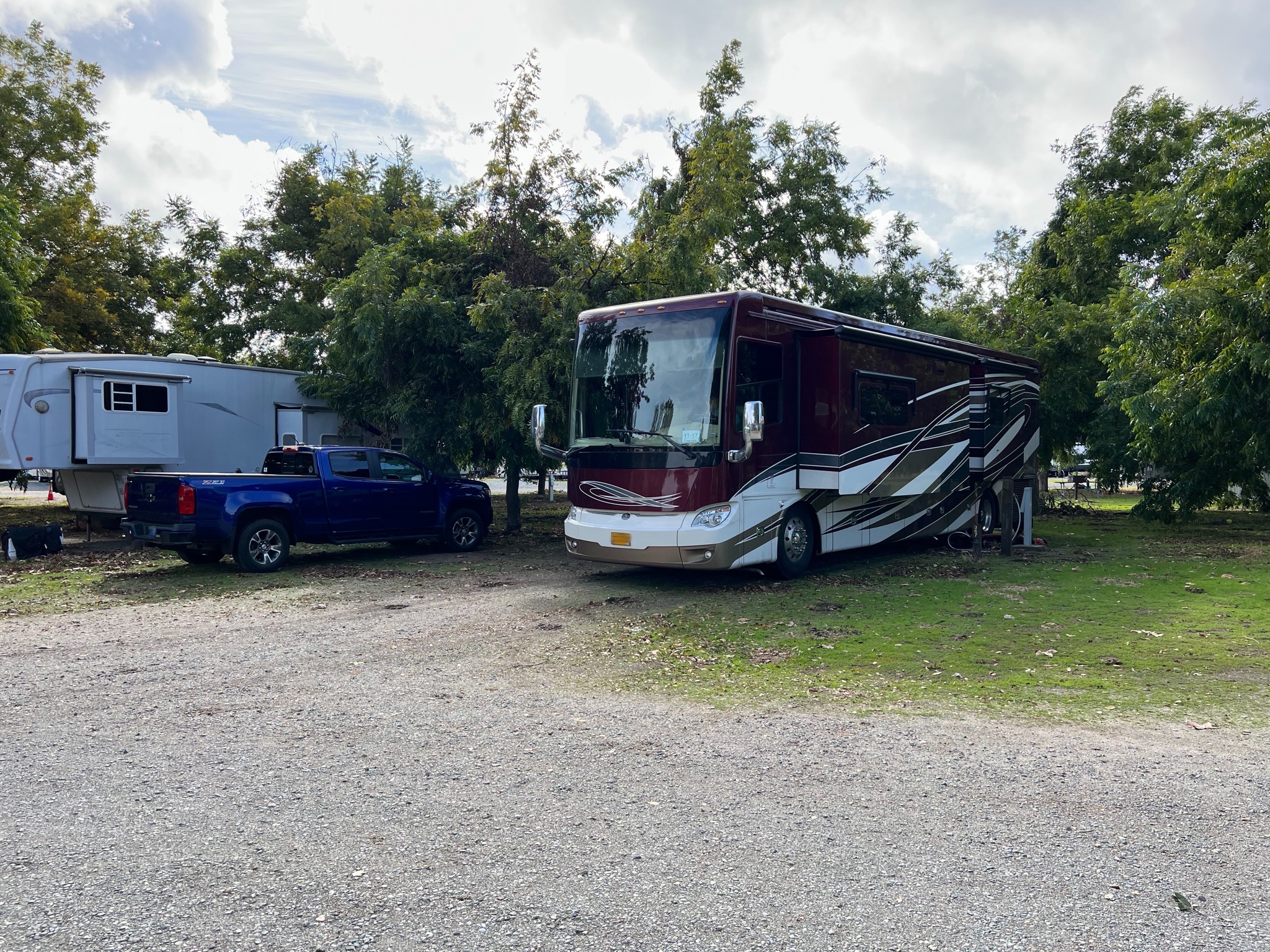 Truck and coach in new campsite