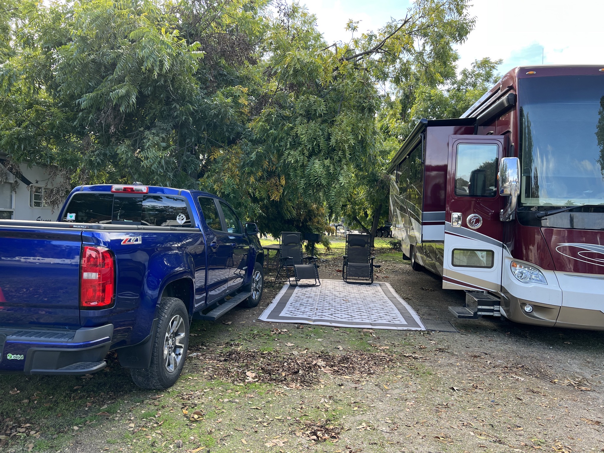 Truck and coach in new campsite