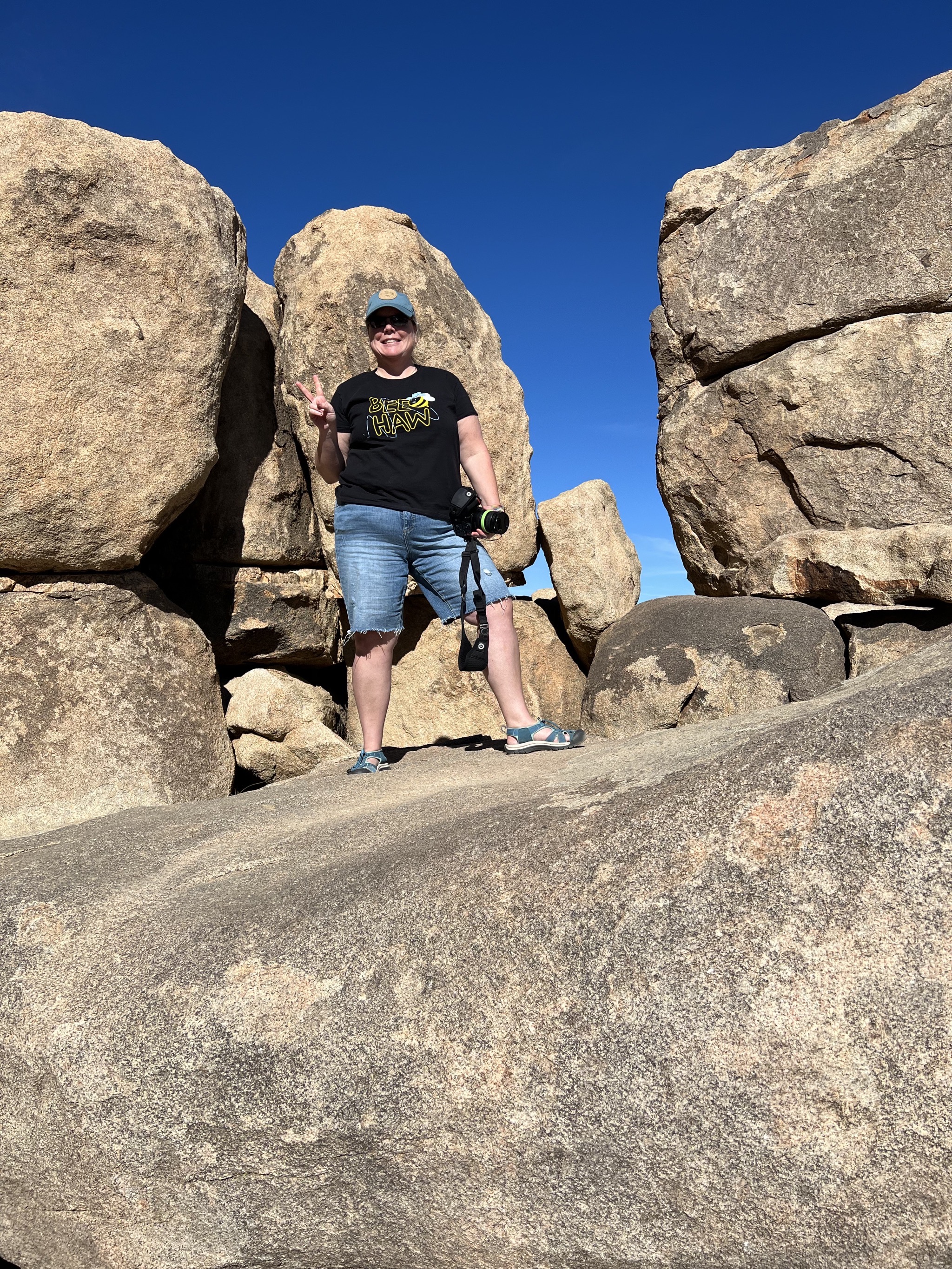 Jenn on a rock