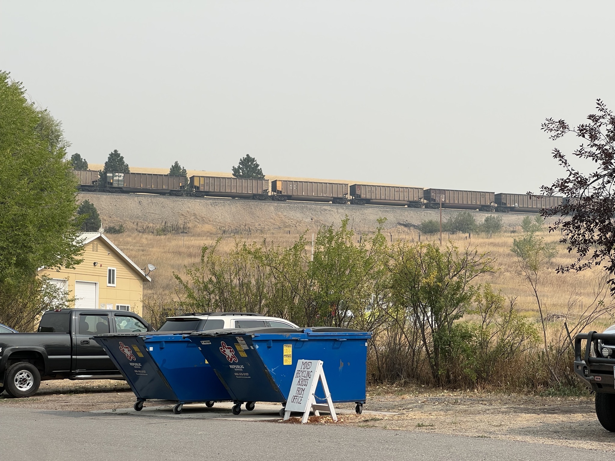 Dumpsters and train
