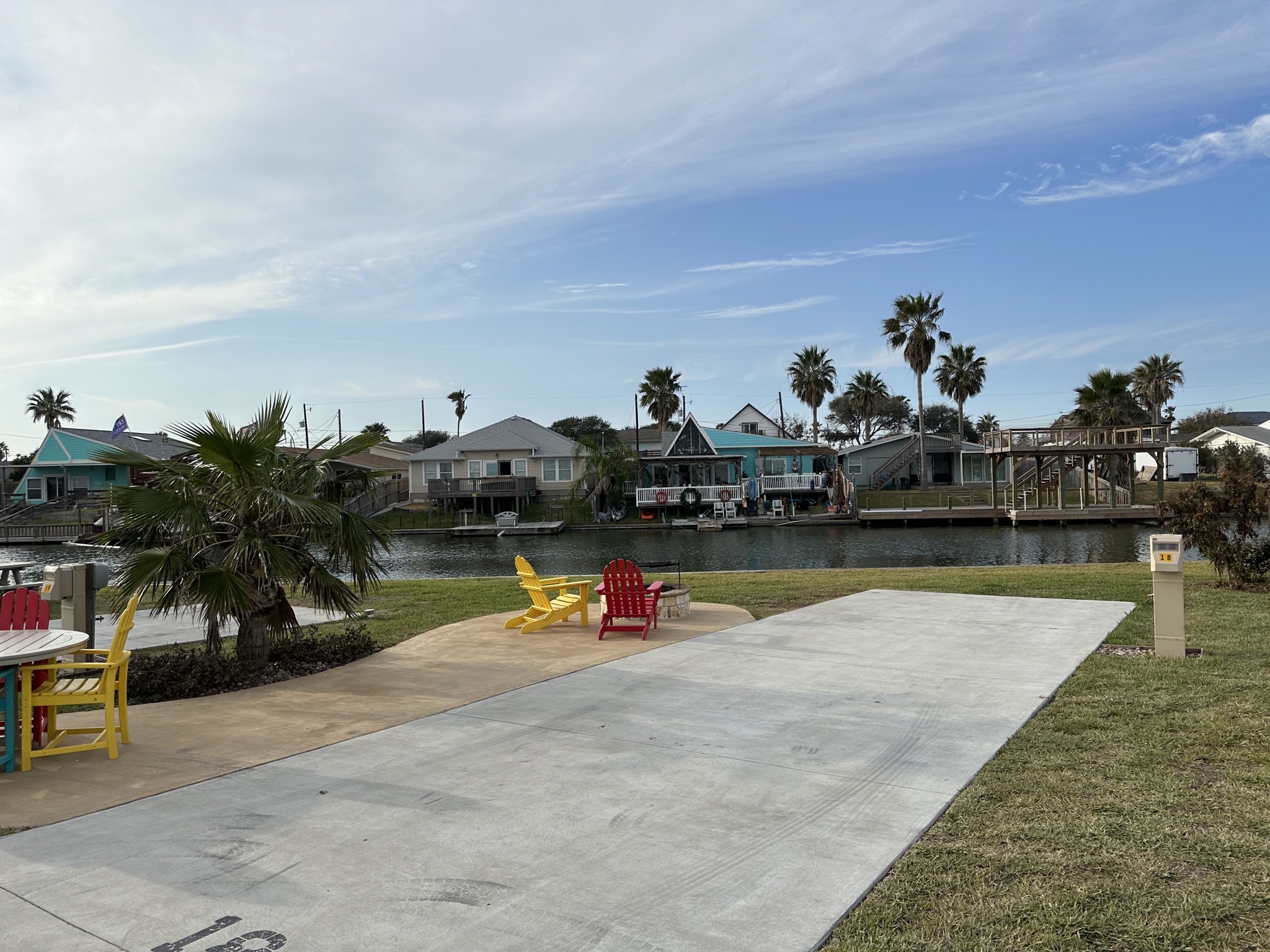 A patio site, and houses beyond