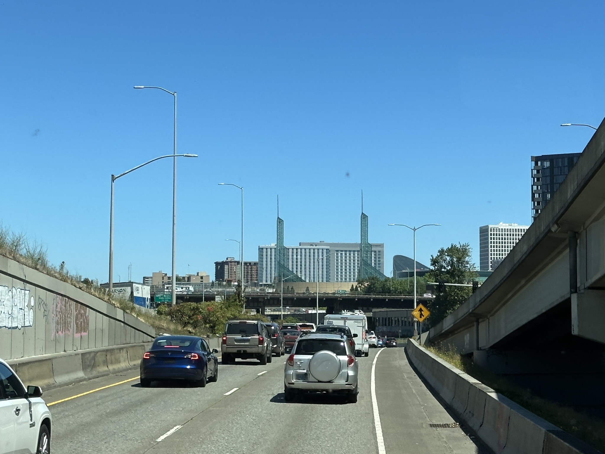 Freeway with convention center in the background