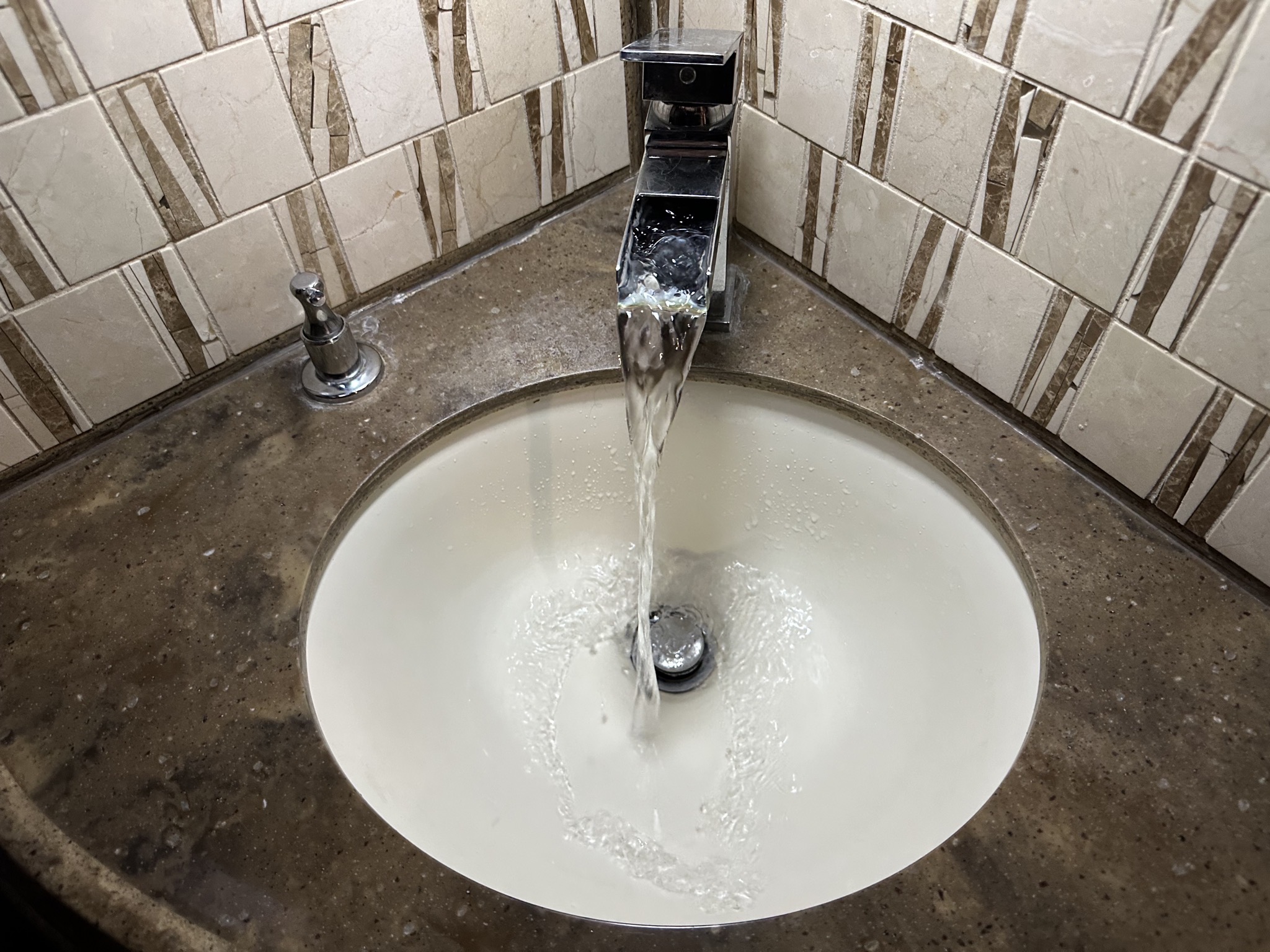 Old faucet in half bath