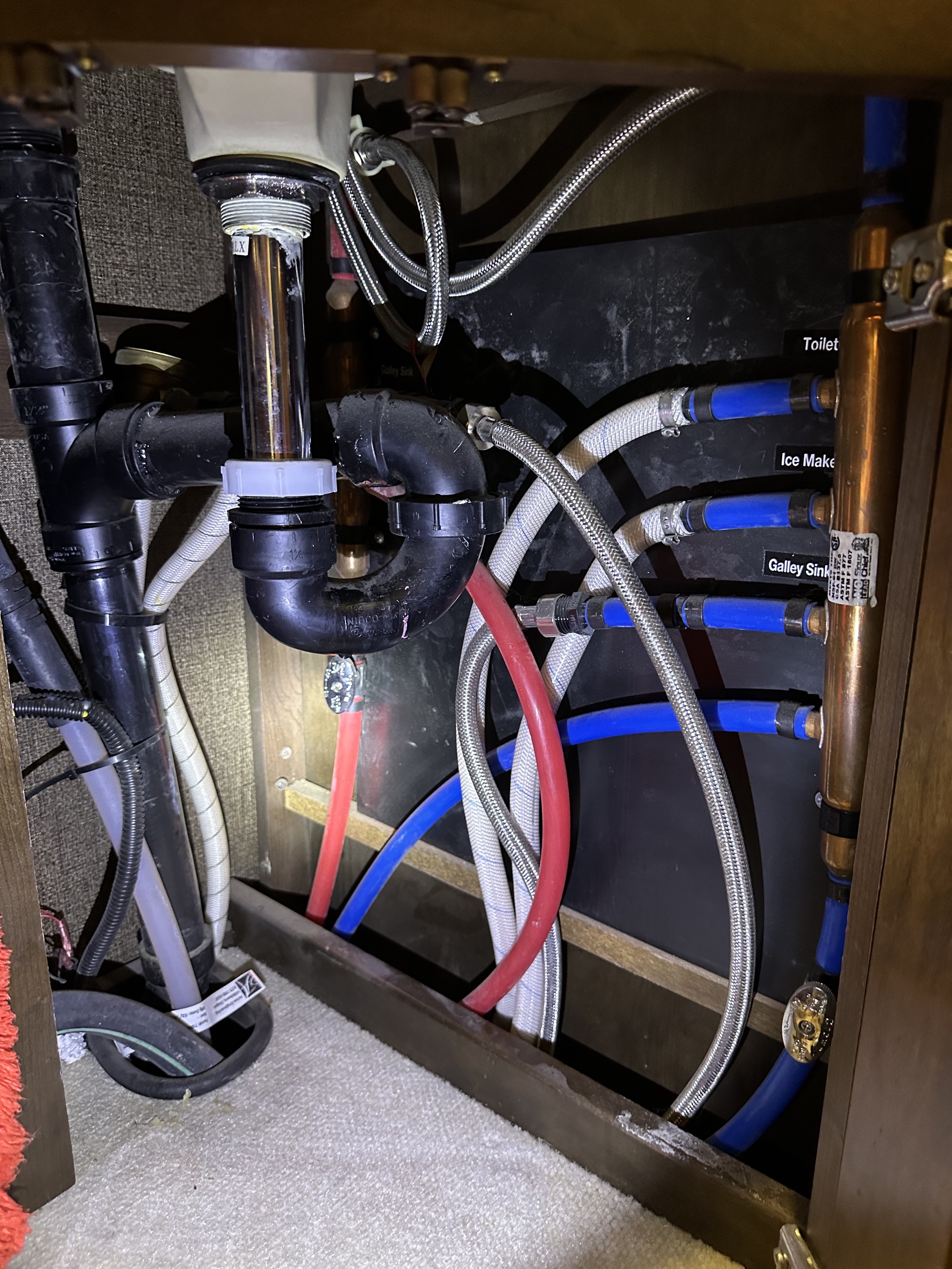 Hoses under half bath sink