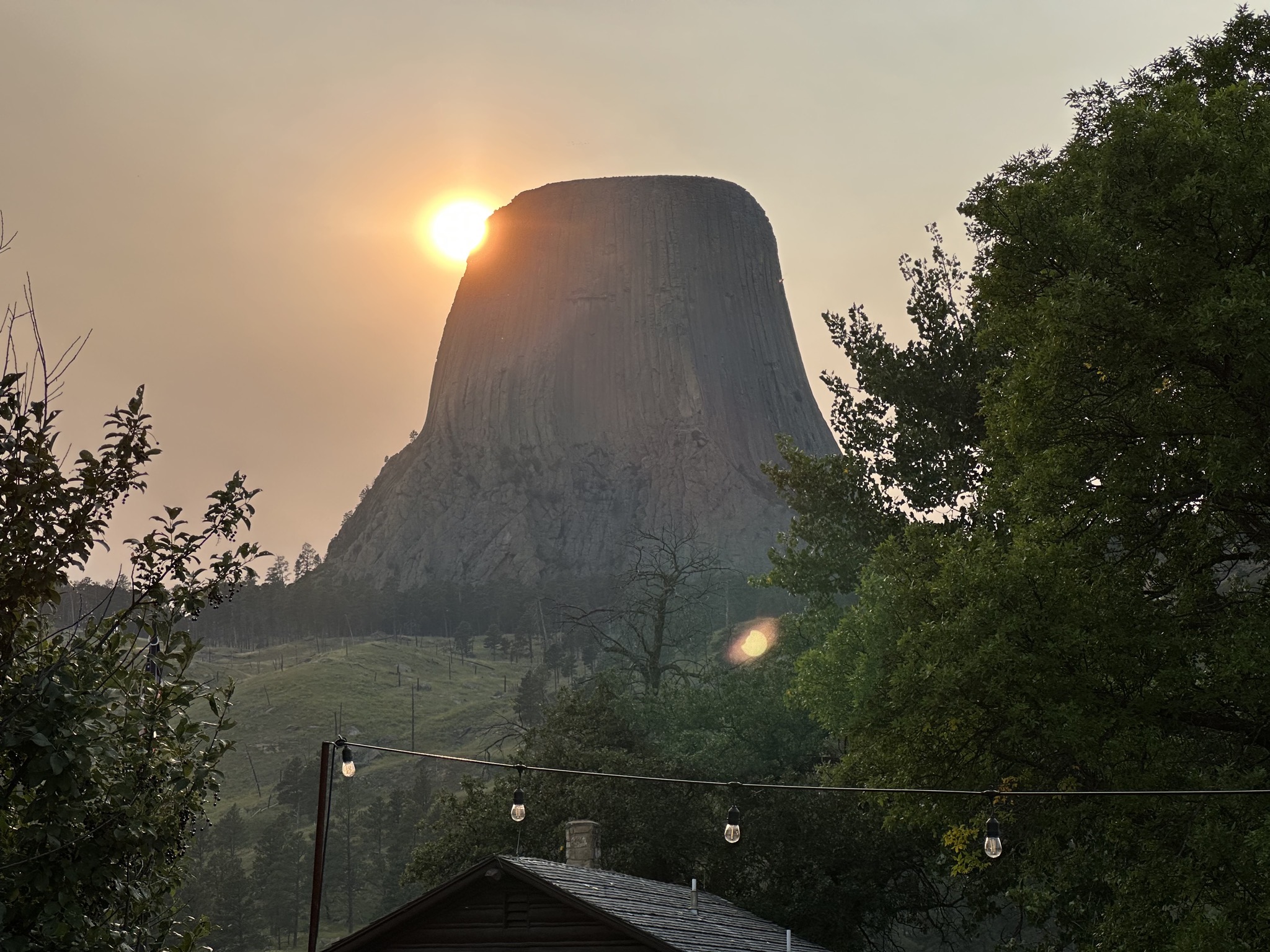 Sun setting behind Devils Tower