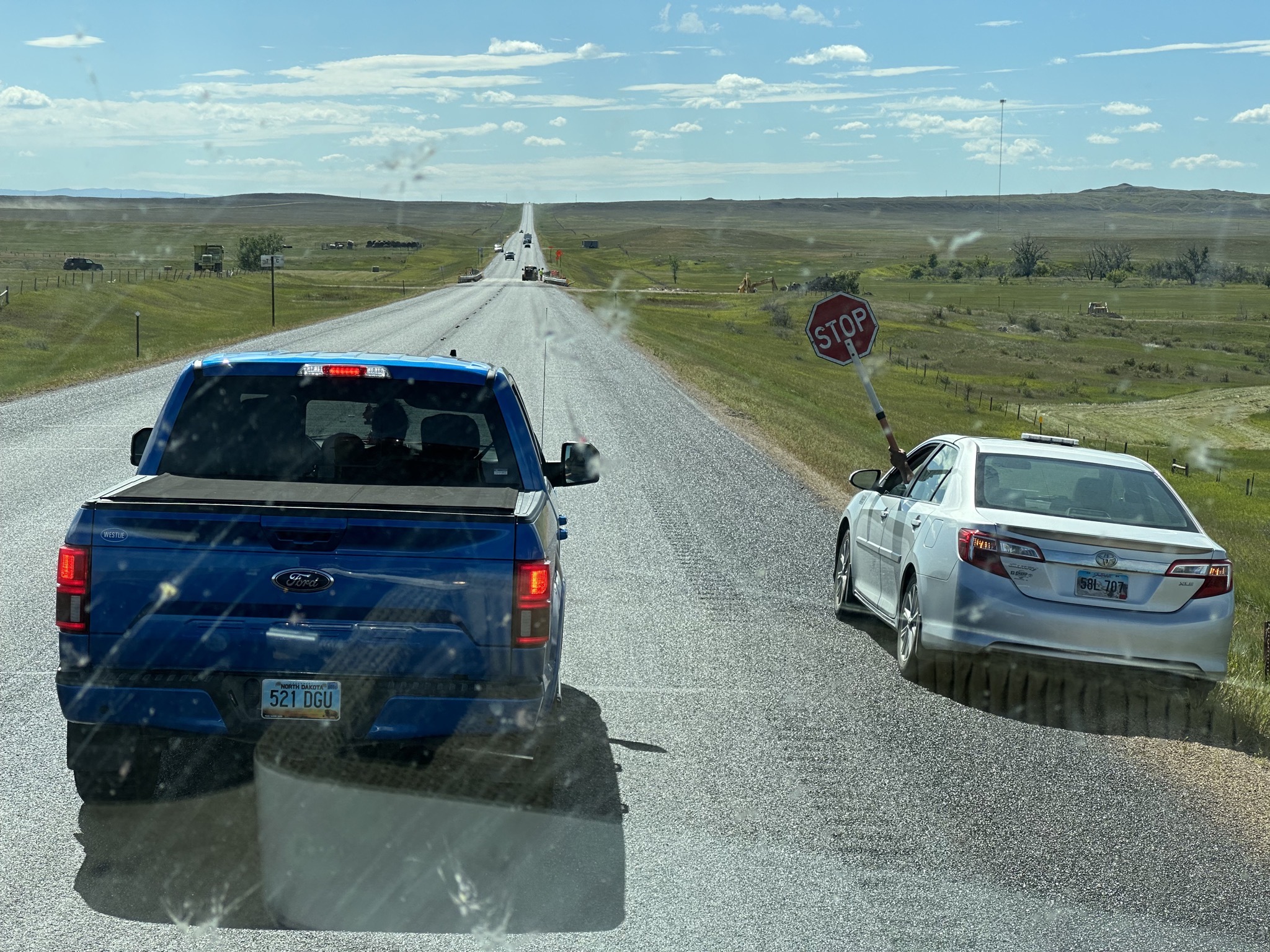Roadworks with flagger in car