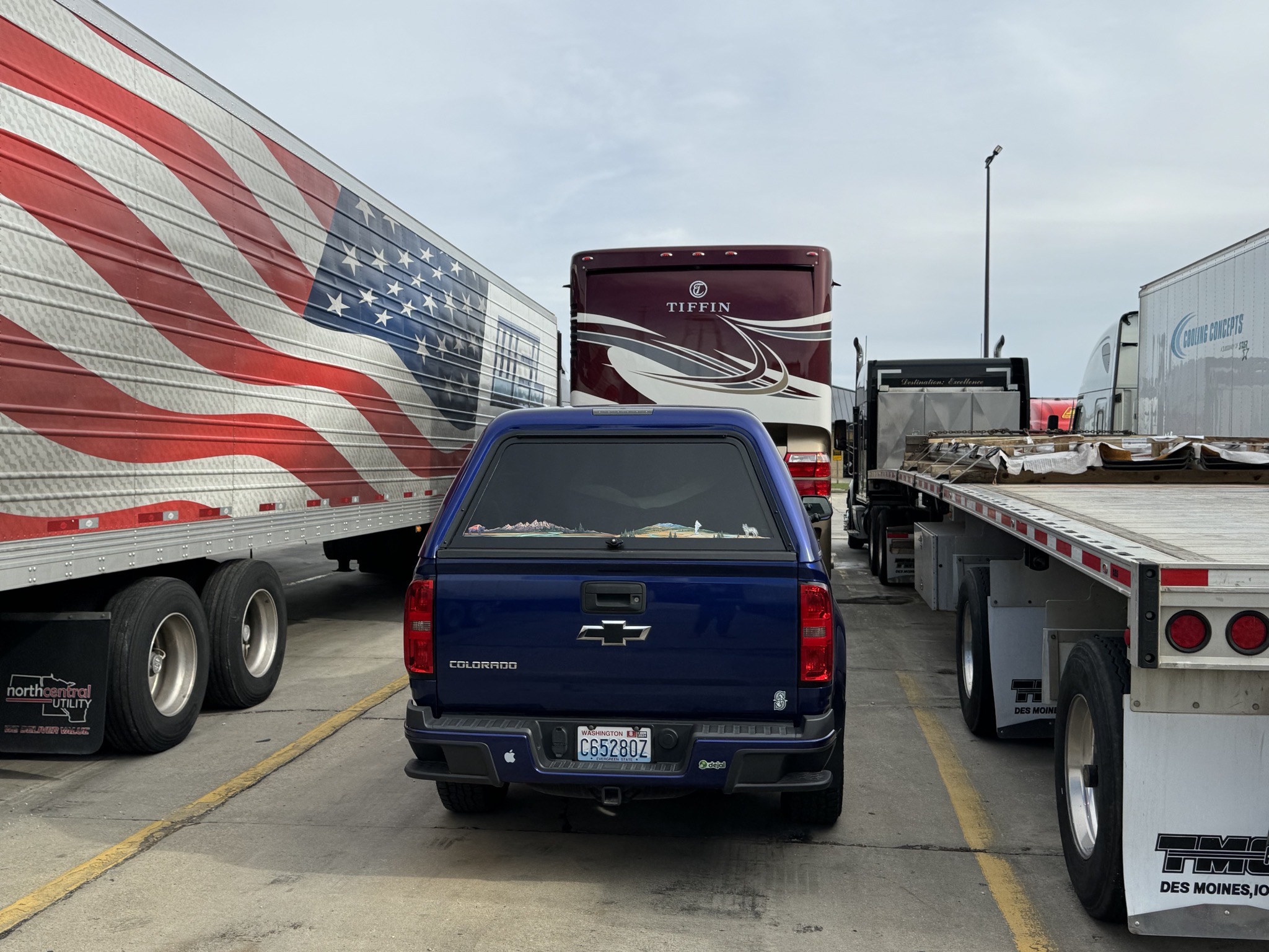 Parked between trucks