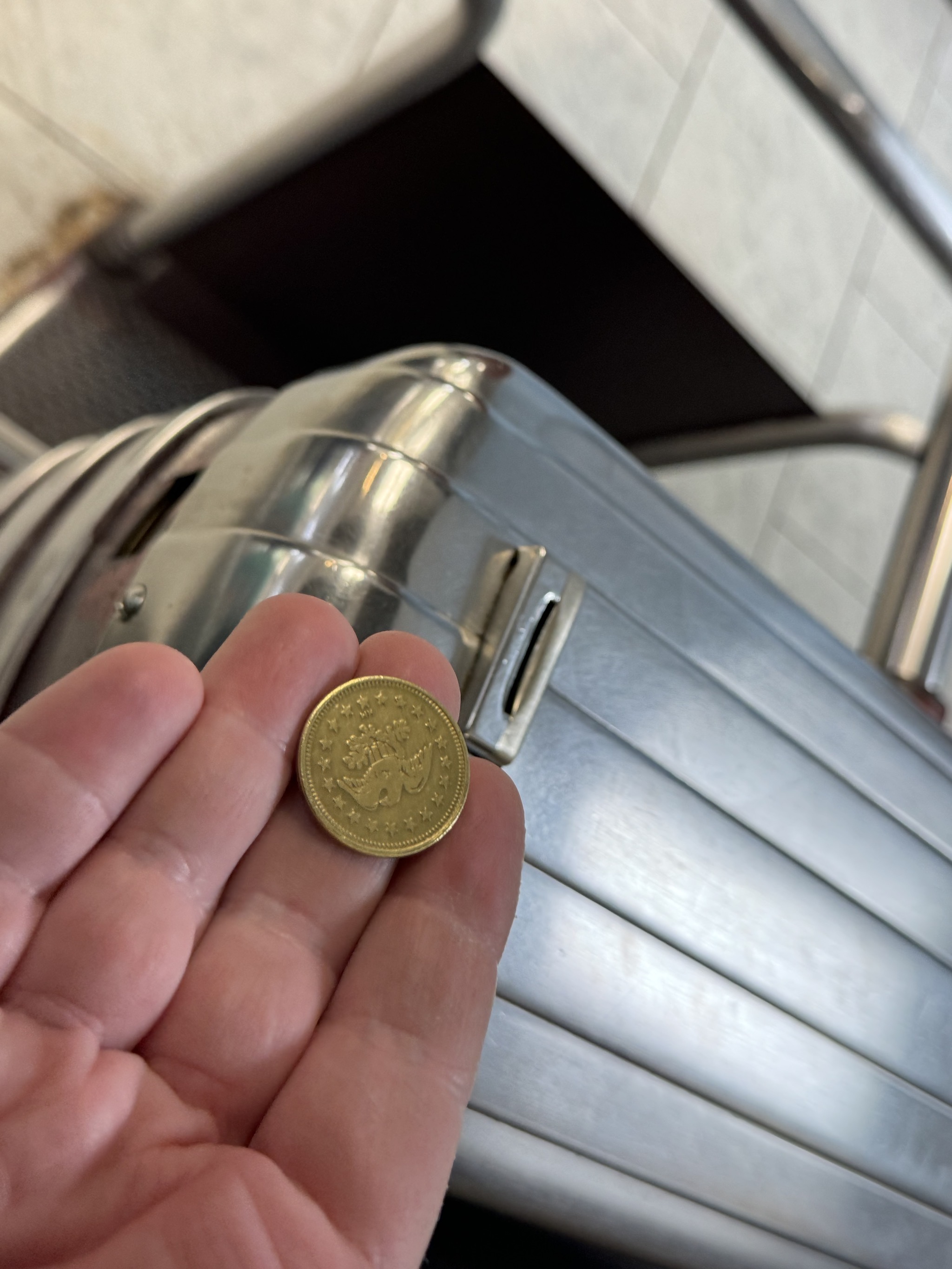 Token to go up the elevator