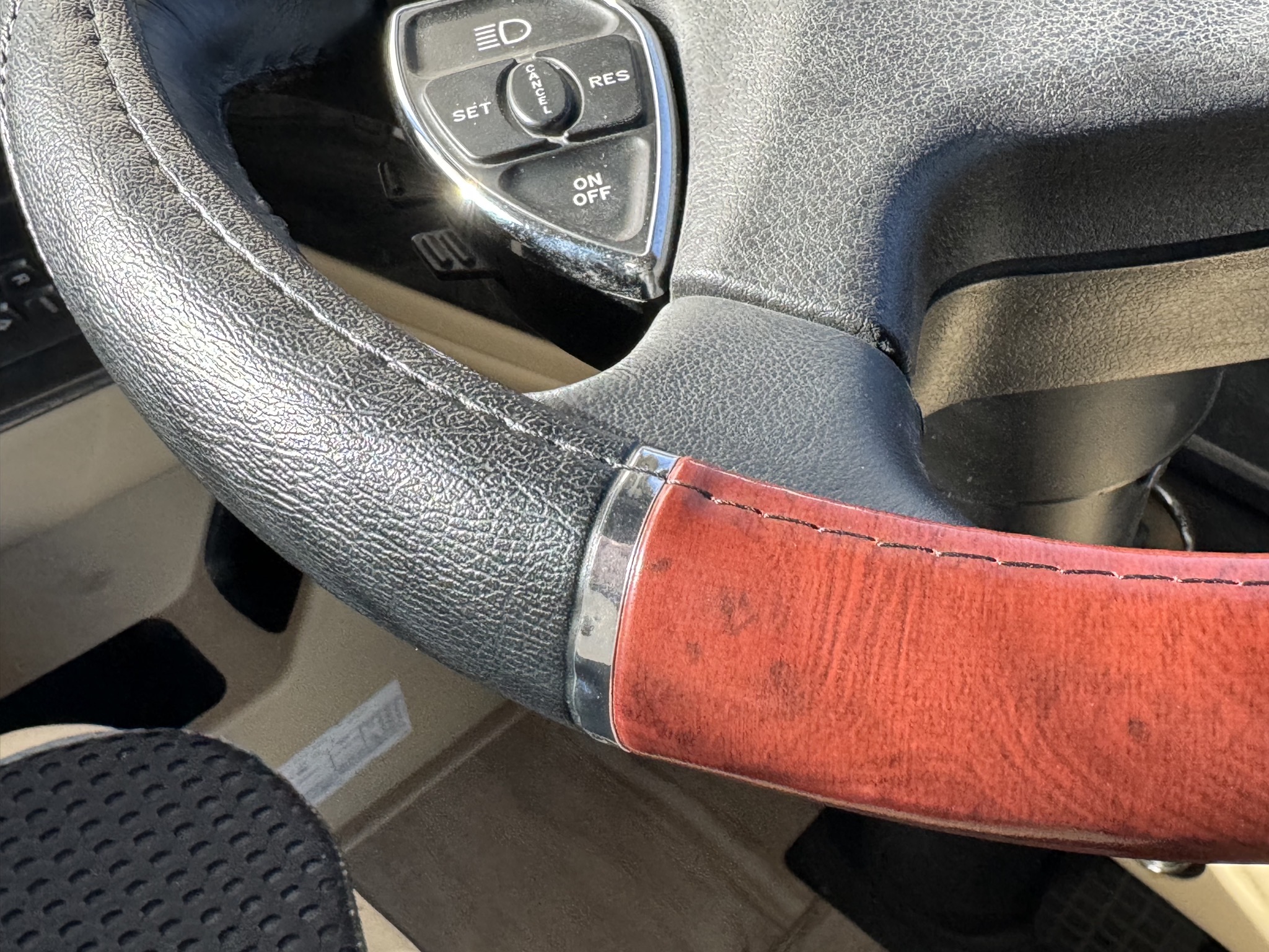 Steering wheel with cover