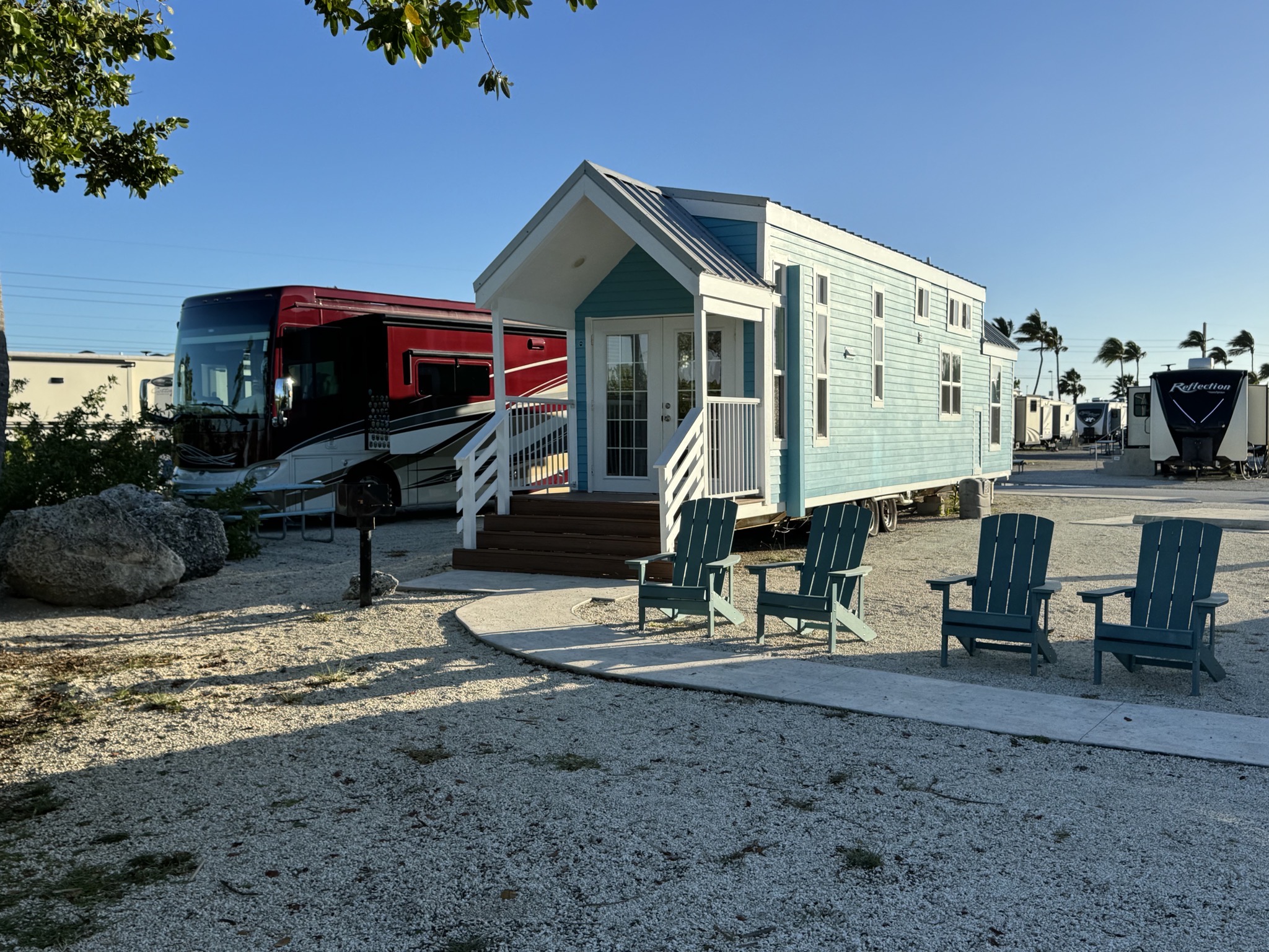 Our coach next to tiny home