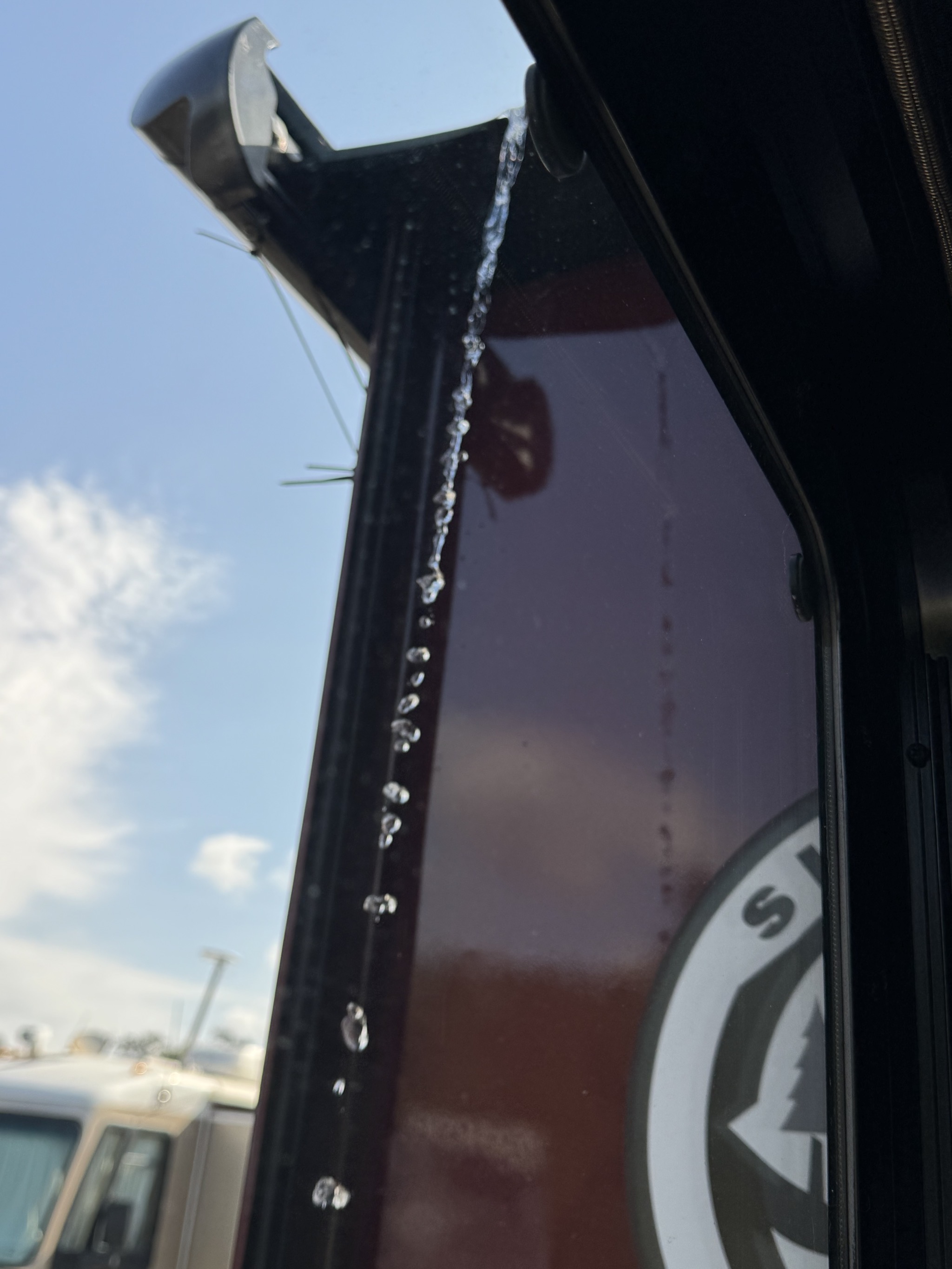 Rain coming off slide topper