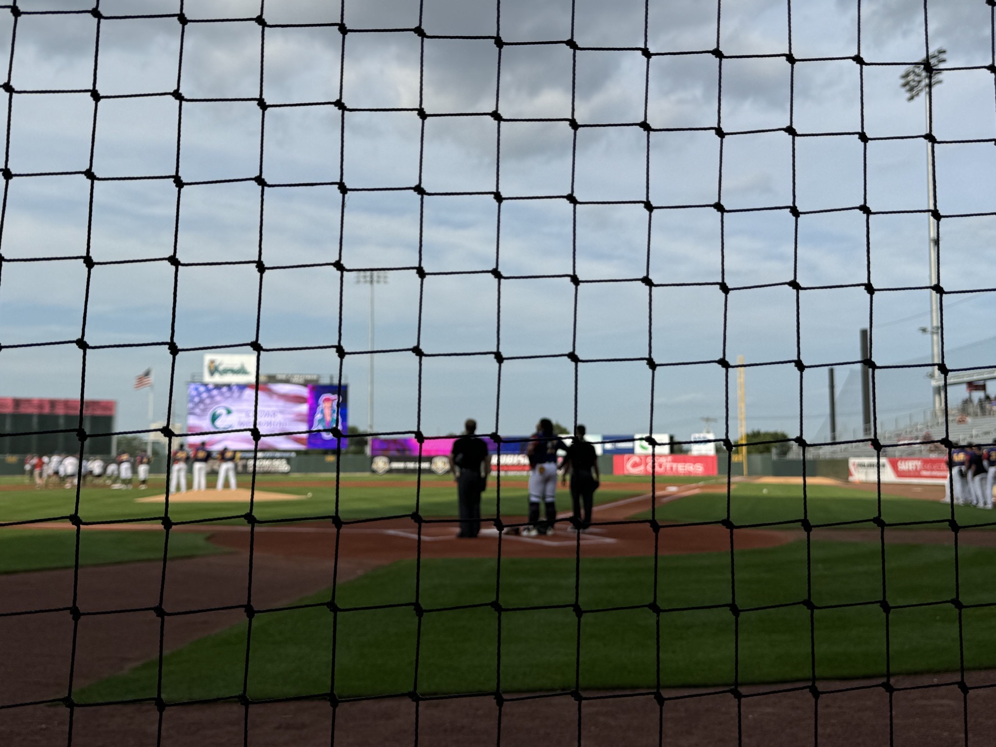 Right behind the net