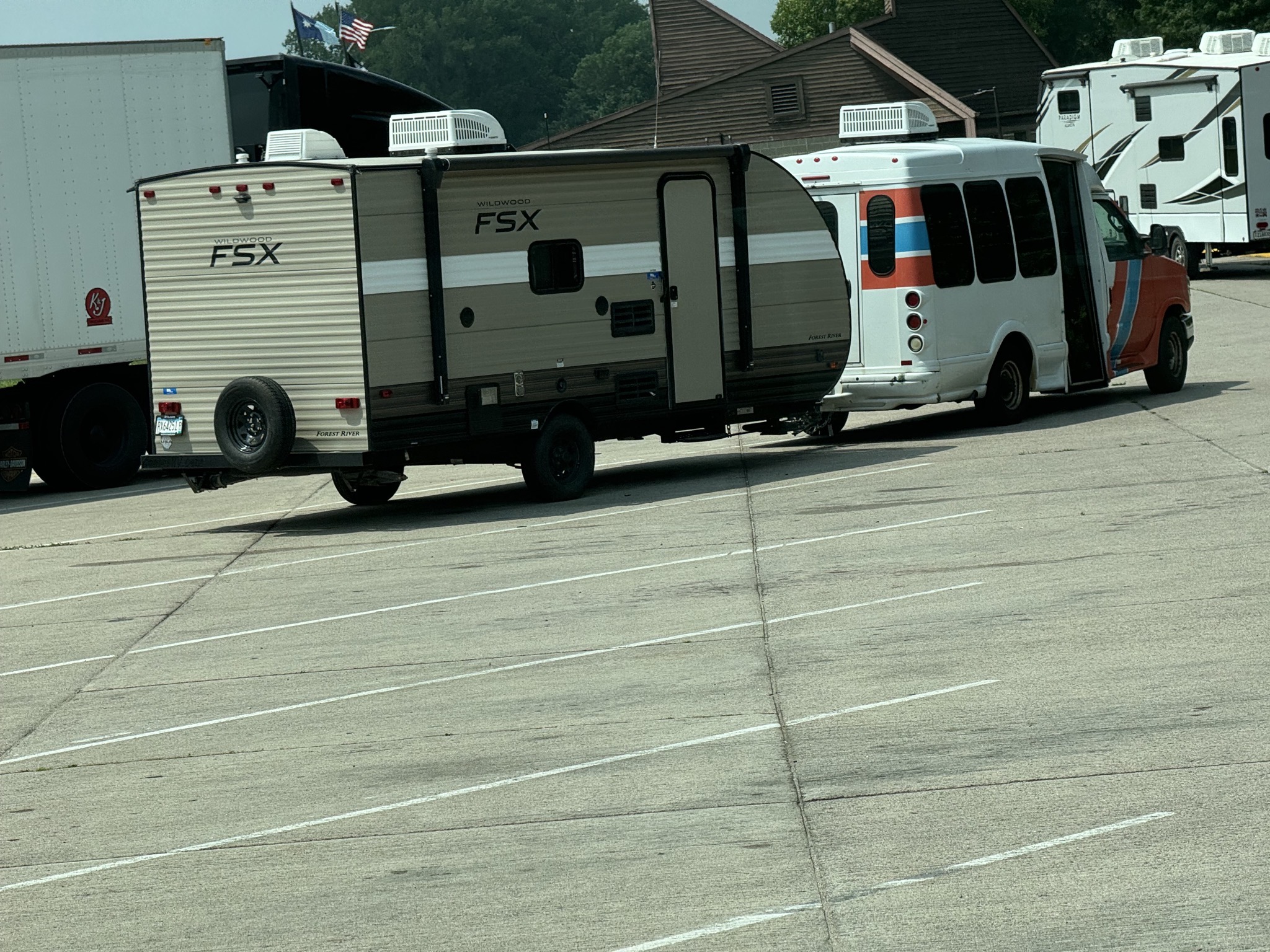 Van towing a trailer