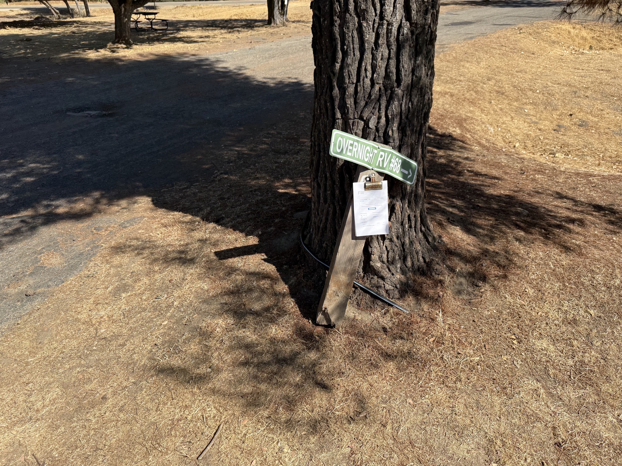 Site number sign with receipt