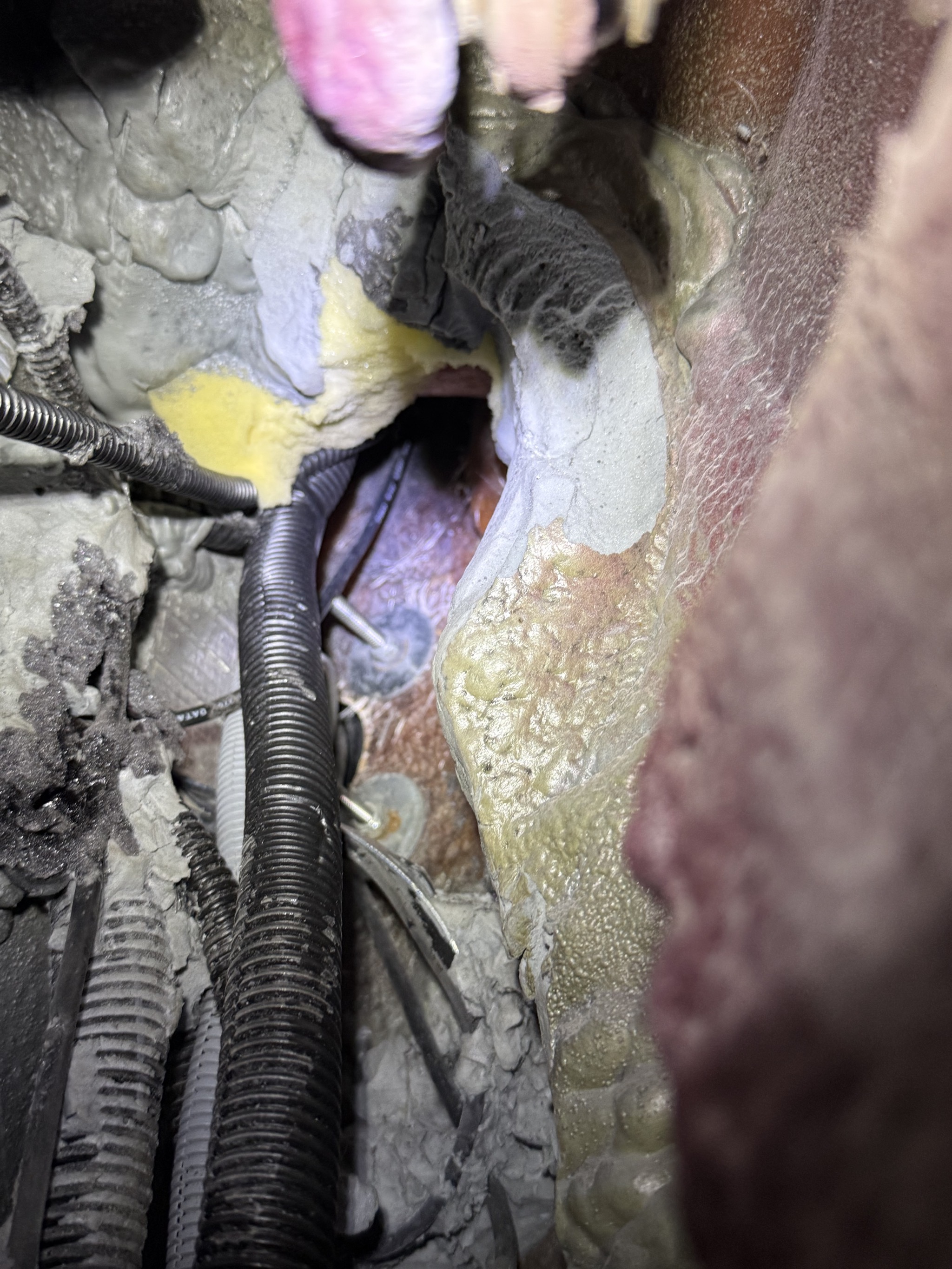 Removed insulation to access bolts