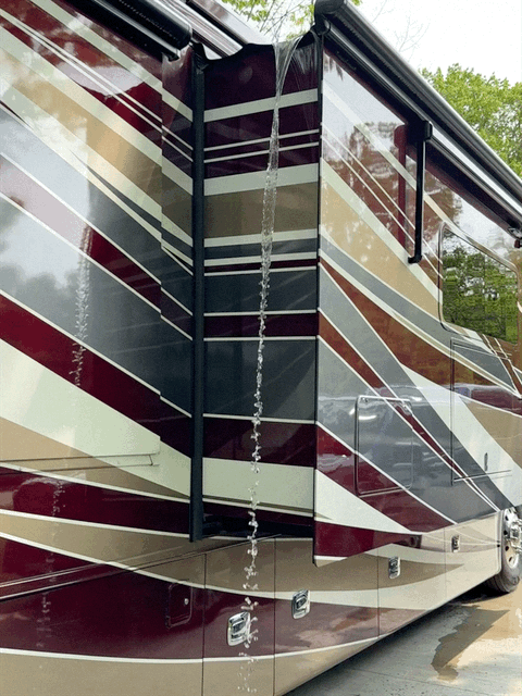 Rain pouring off slide topper