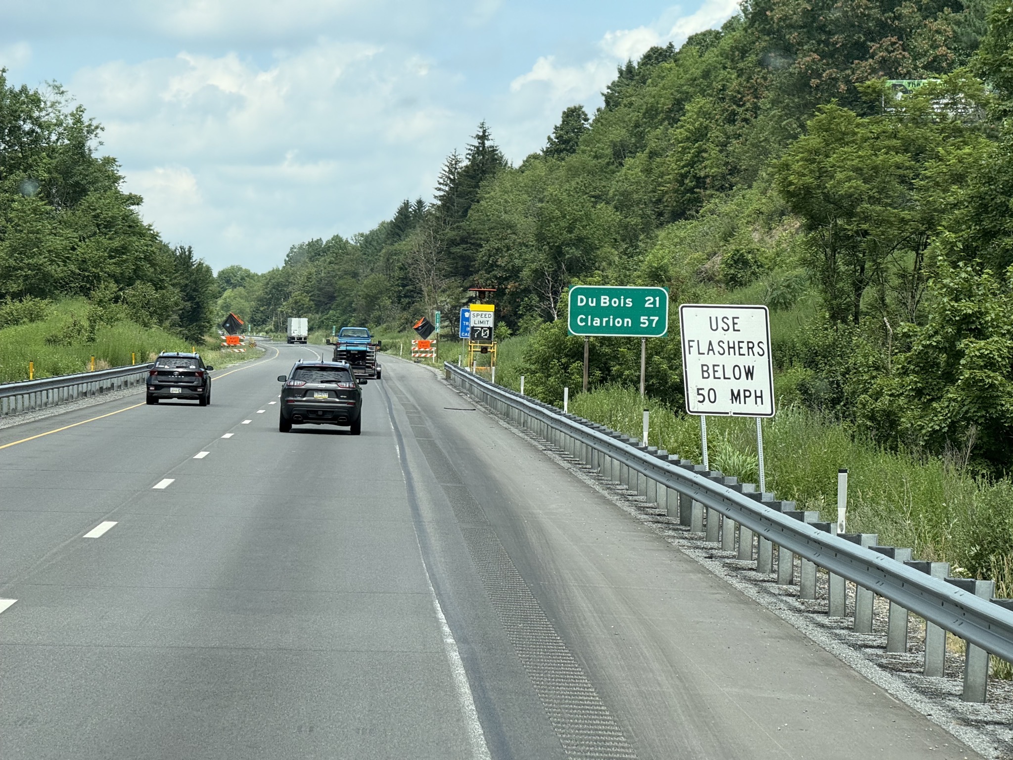 Use Flashers Below 50 MPH