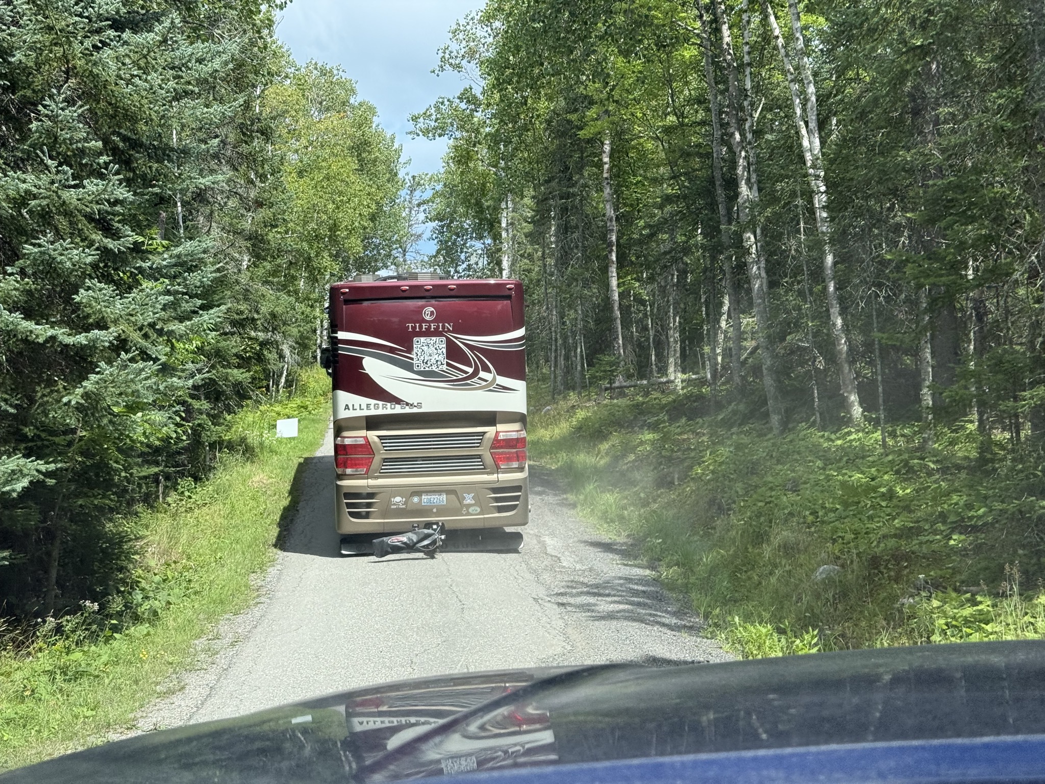 Steep single-lane road up the hill