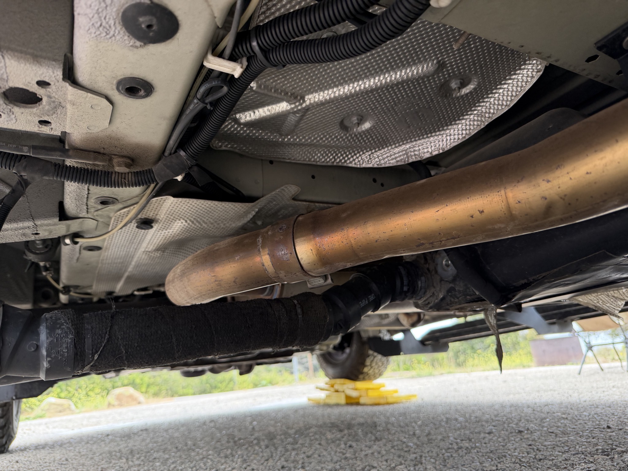 Engine exhaust, gray tank drain
