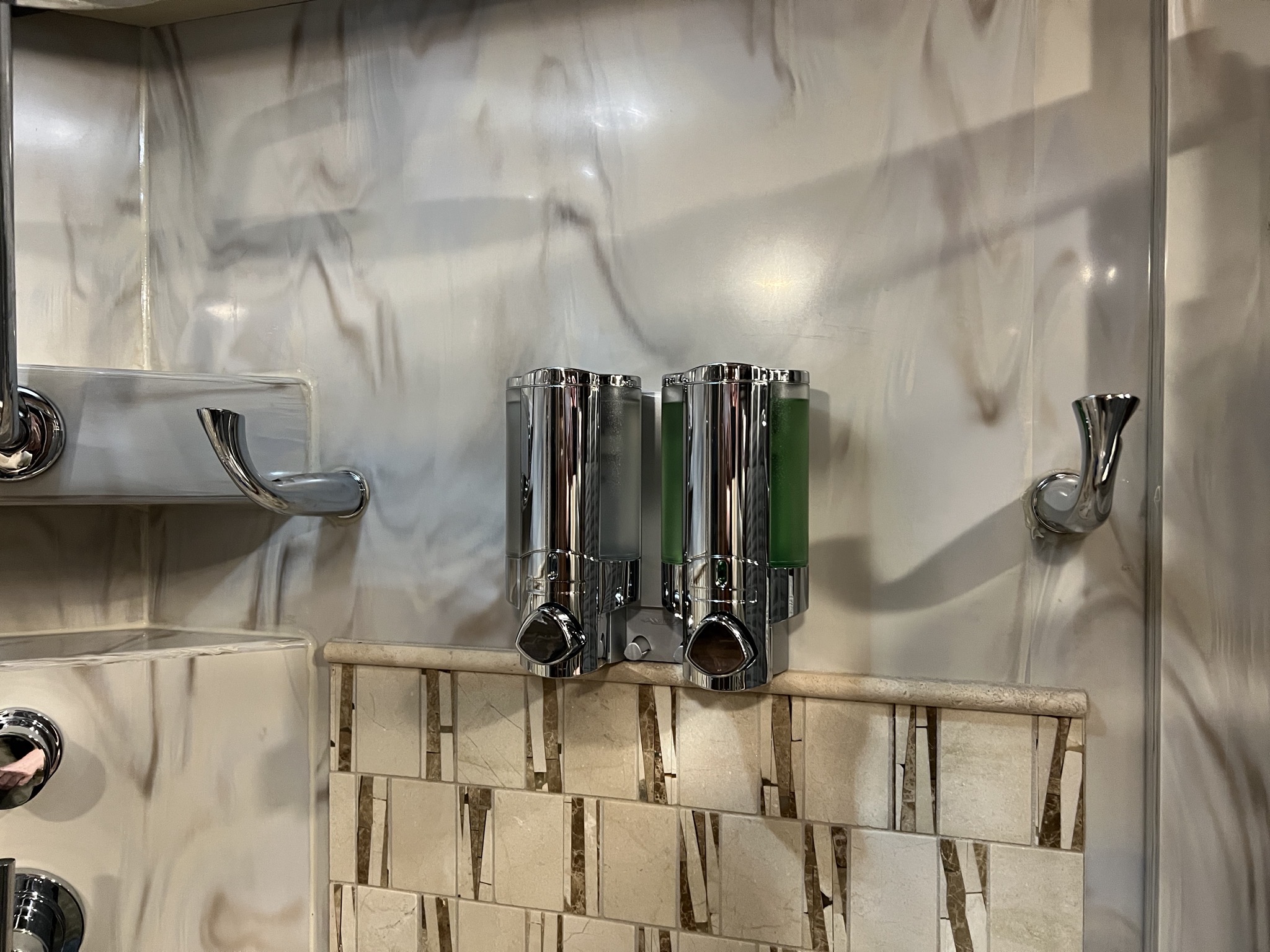 Shower dispensers