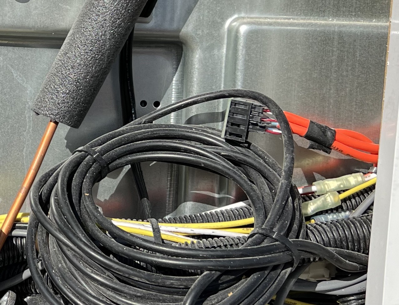 Wires behind fridge