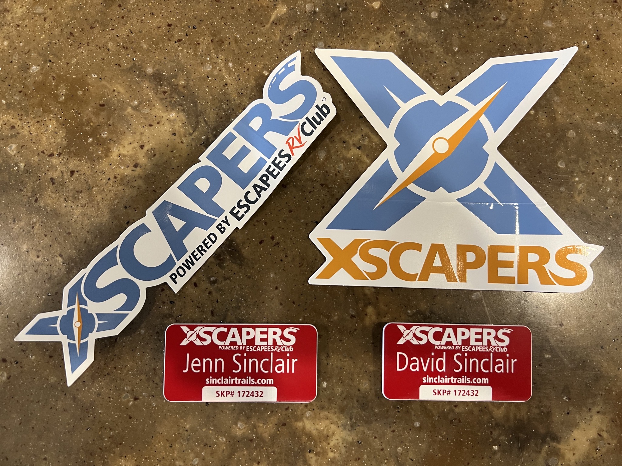 Xscapers stickers and badges