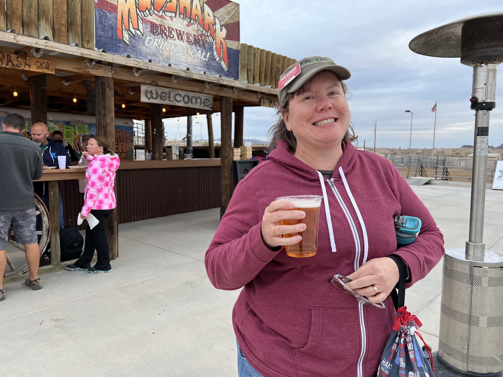 Jenn with a beer