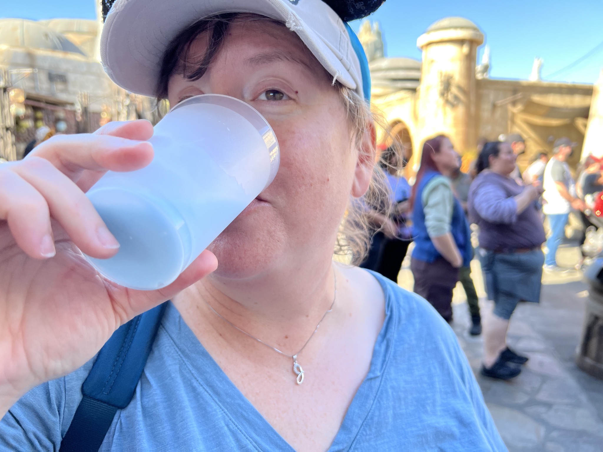 Jenn drinking blue milk