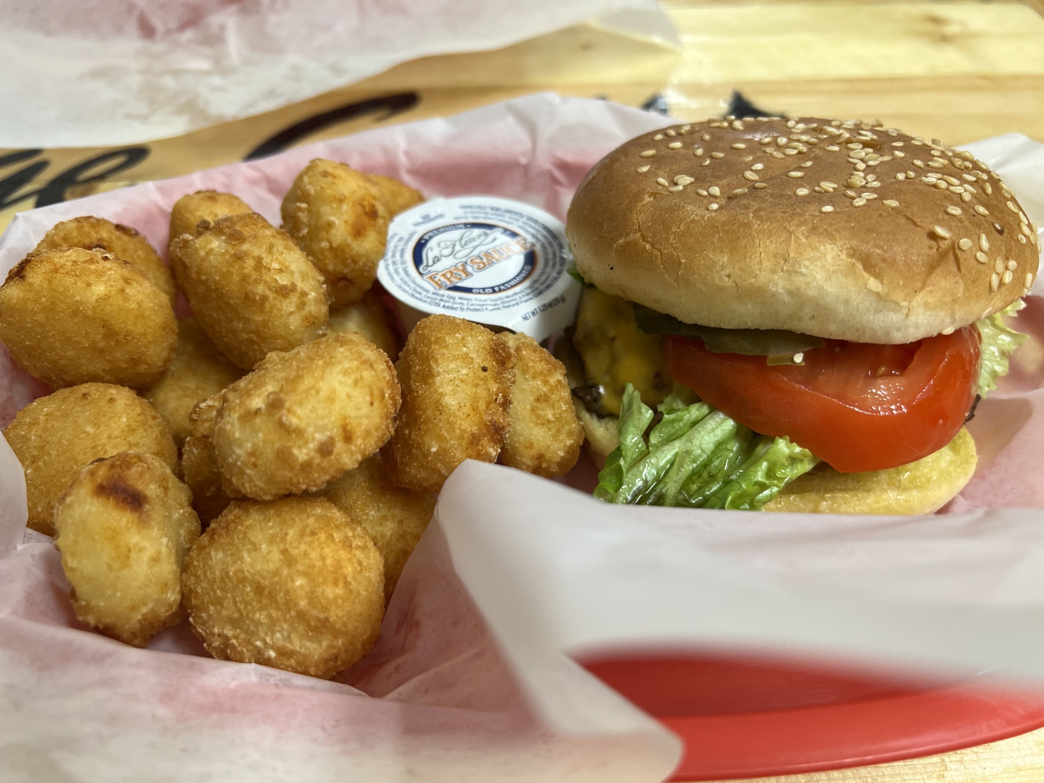Cheese-filled tots and burger