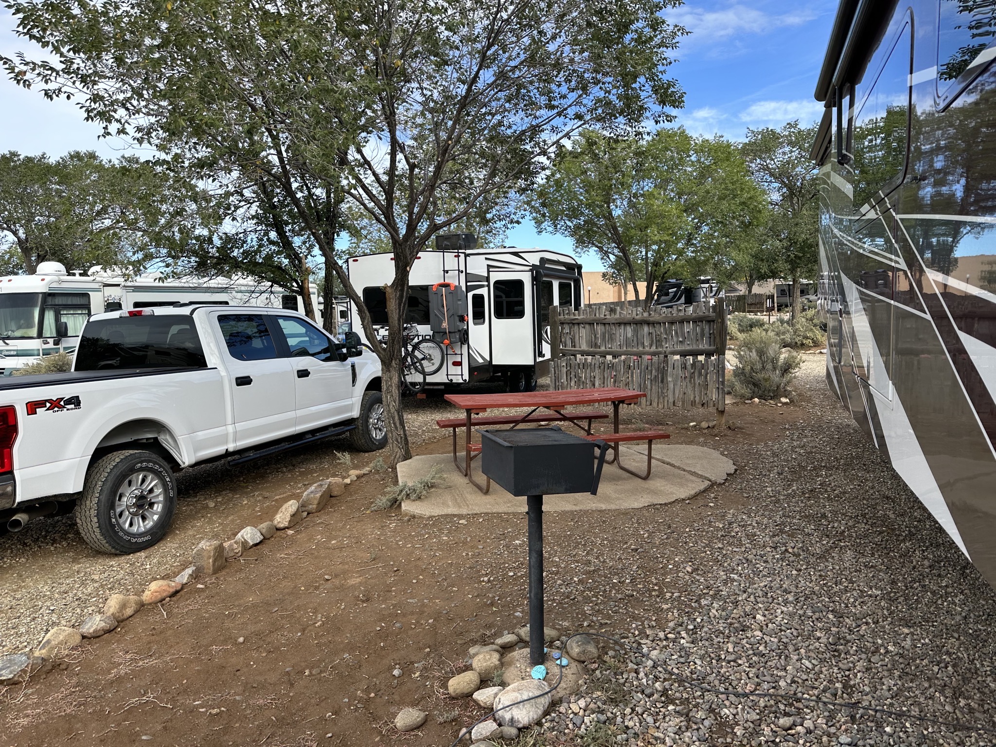 Picnic table and charcoal grill