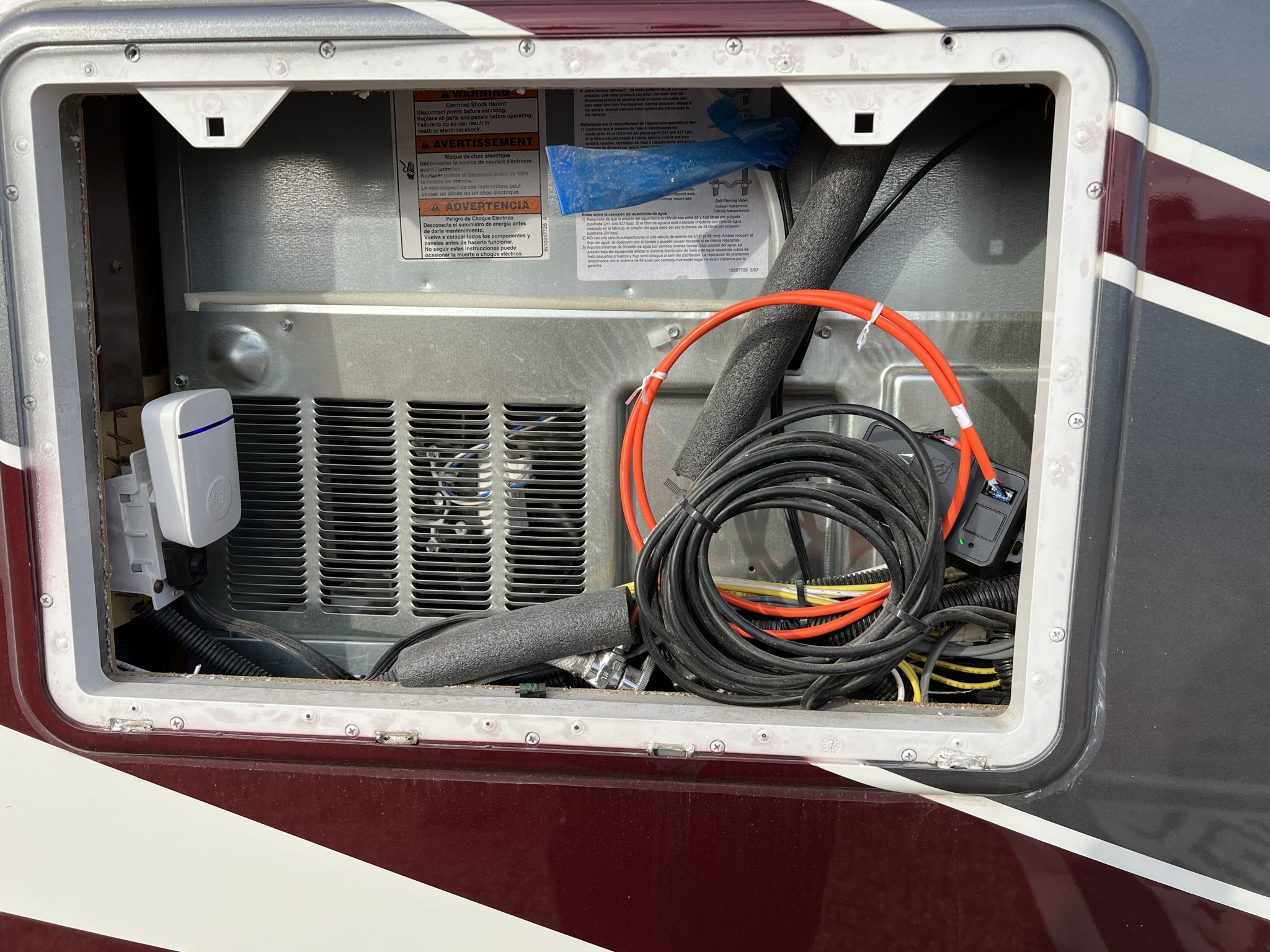 Panel behind fridge