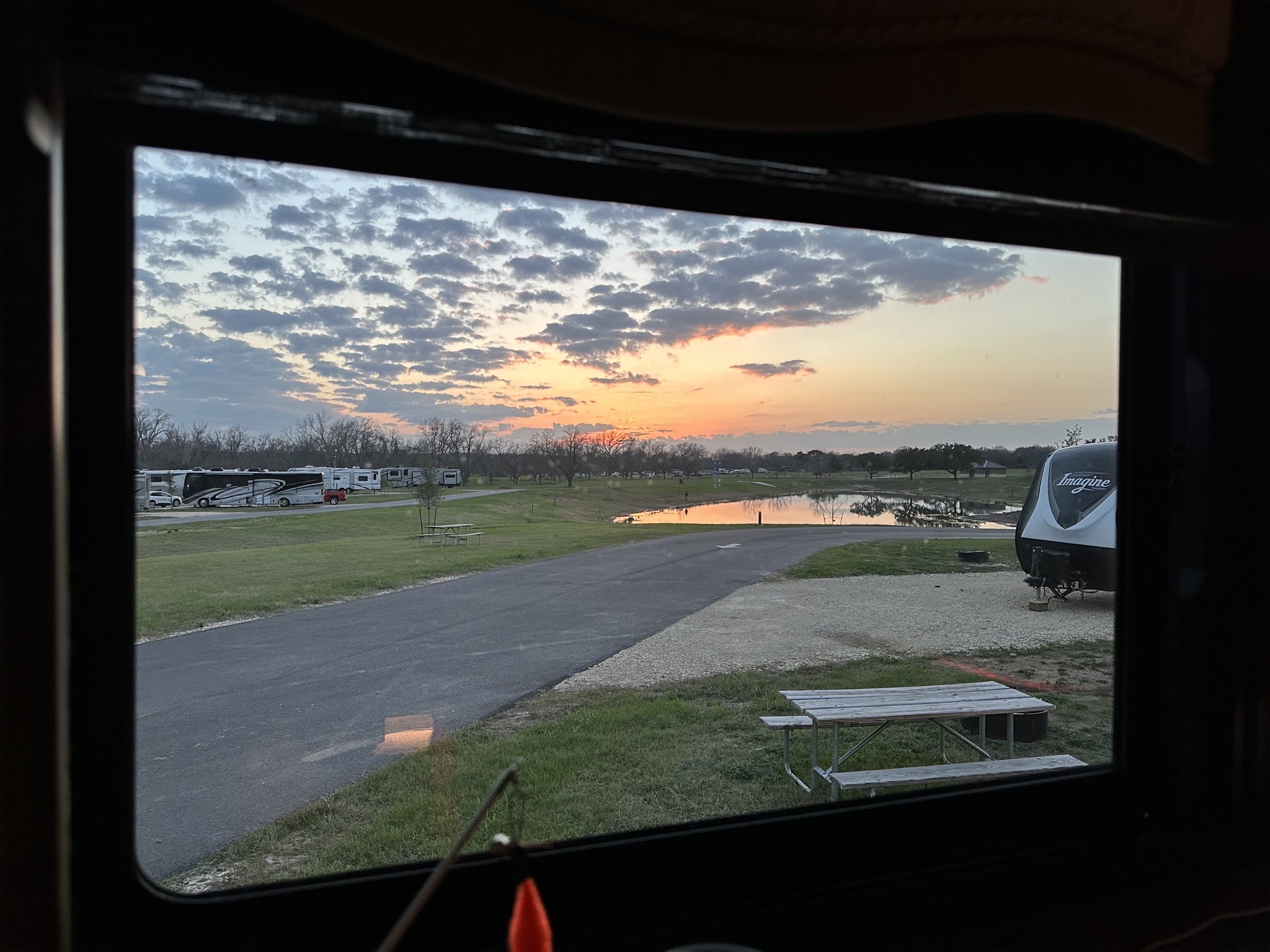 Sunset and pond out window