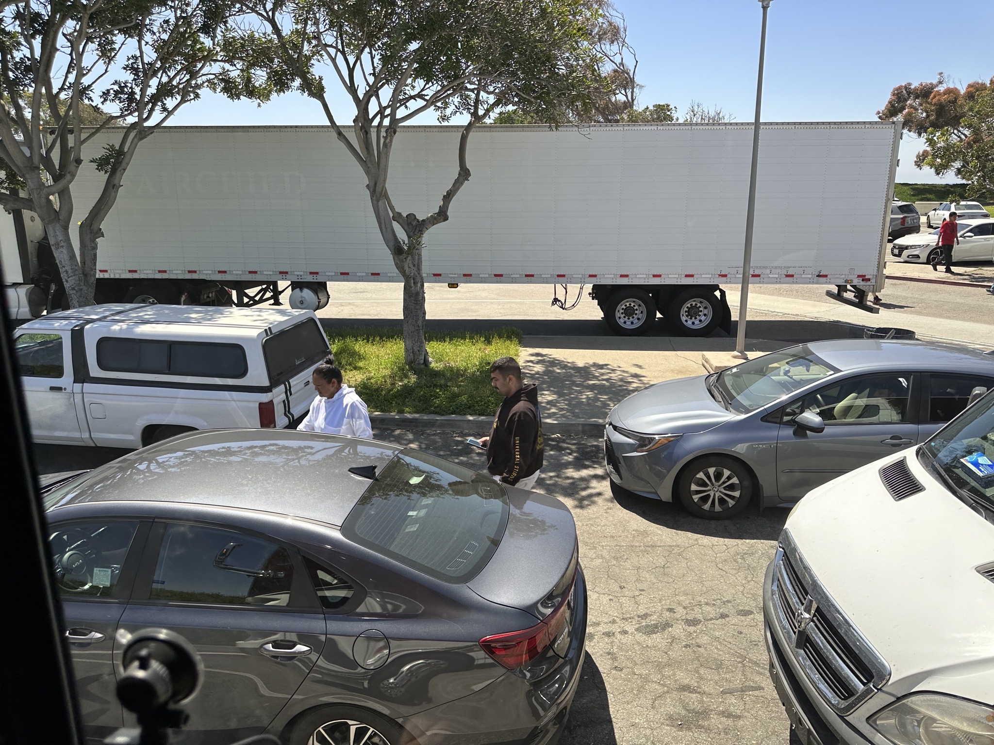 Cars parked in truck parking