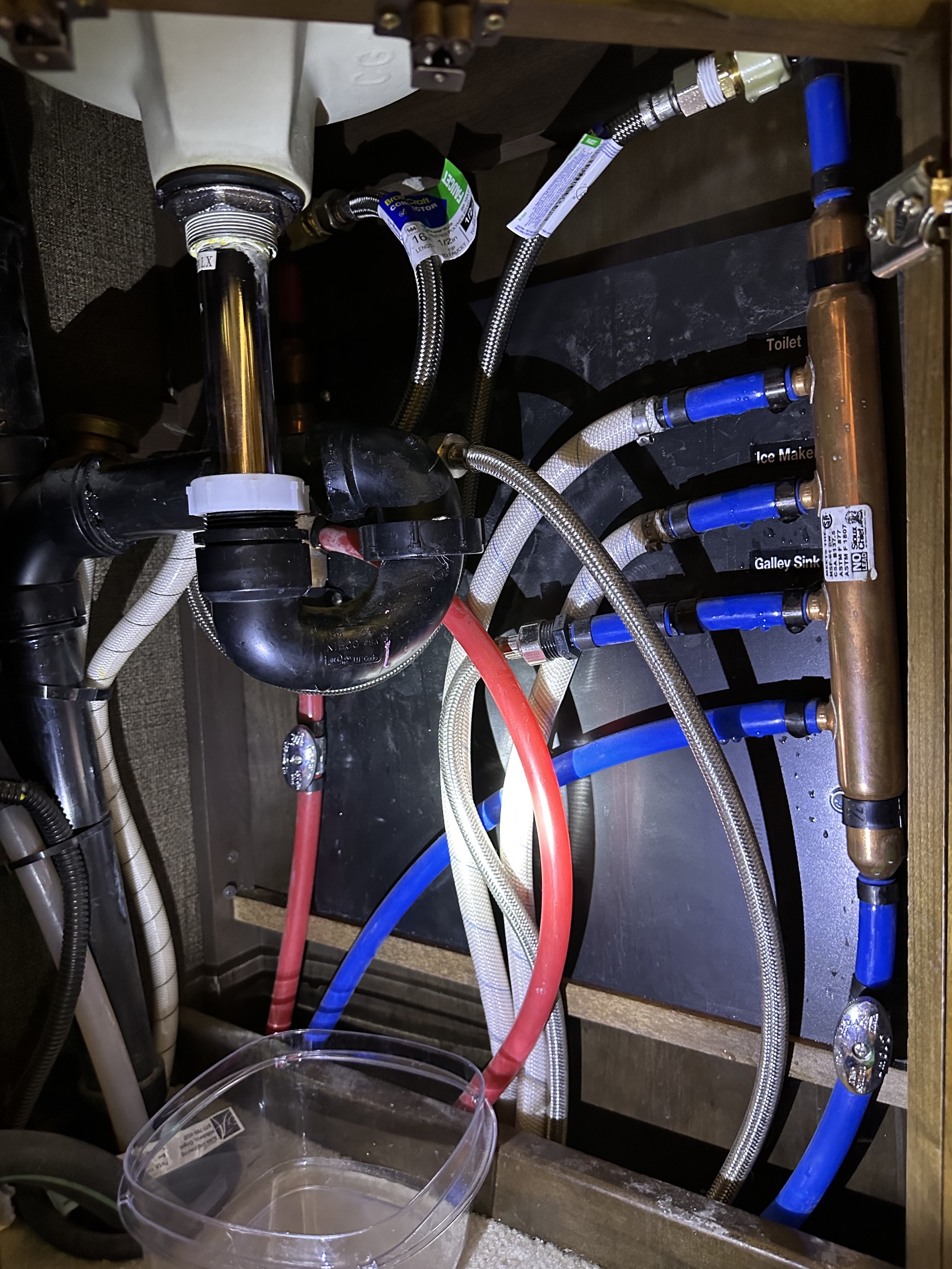 Hoses under half bath sink