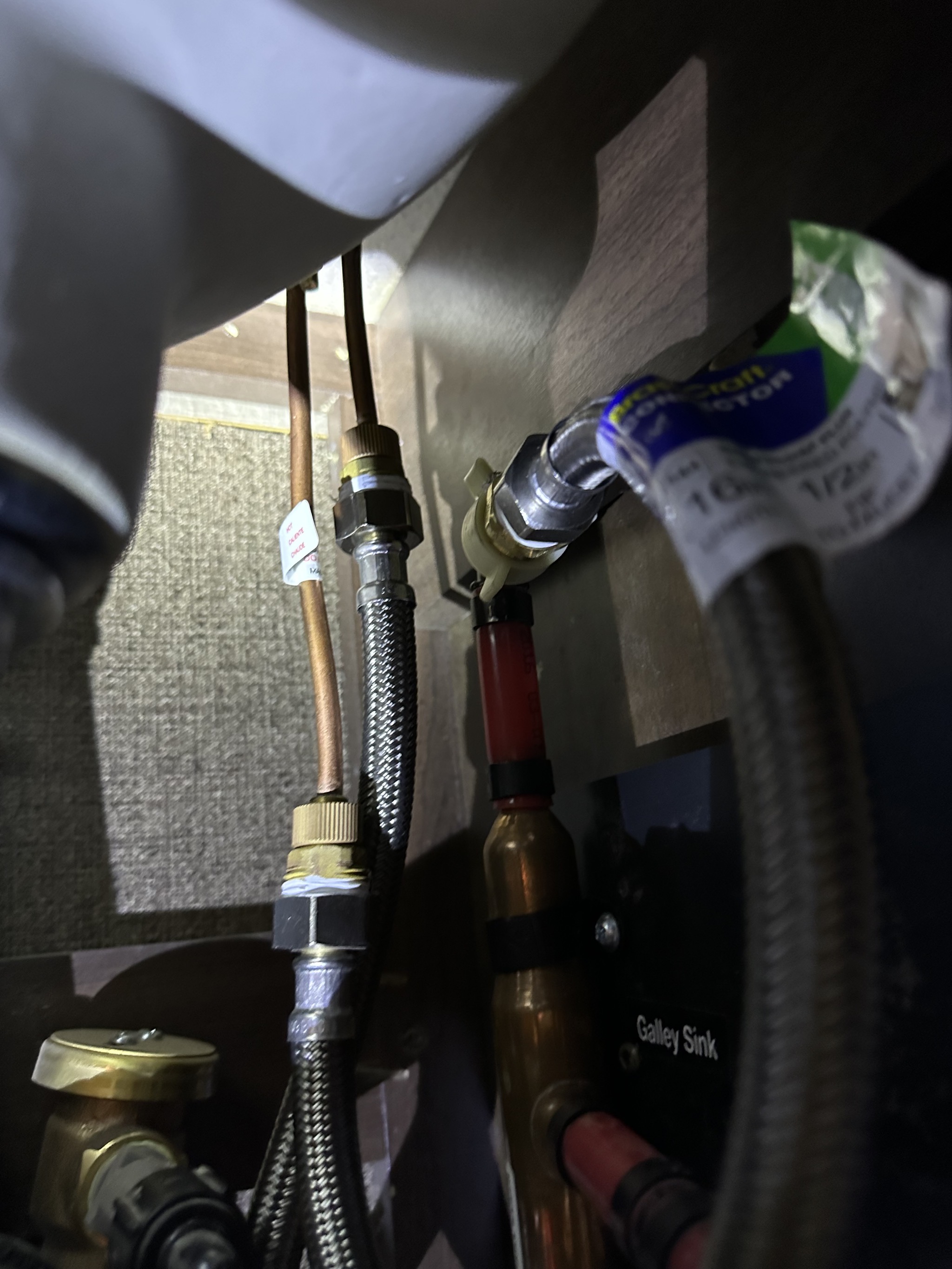 Hoses under half bath sink