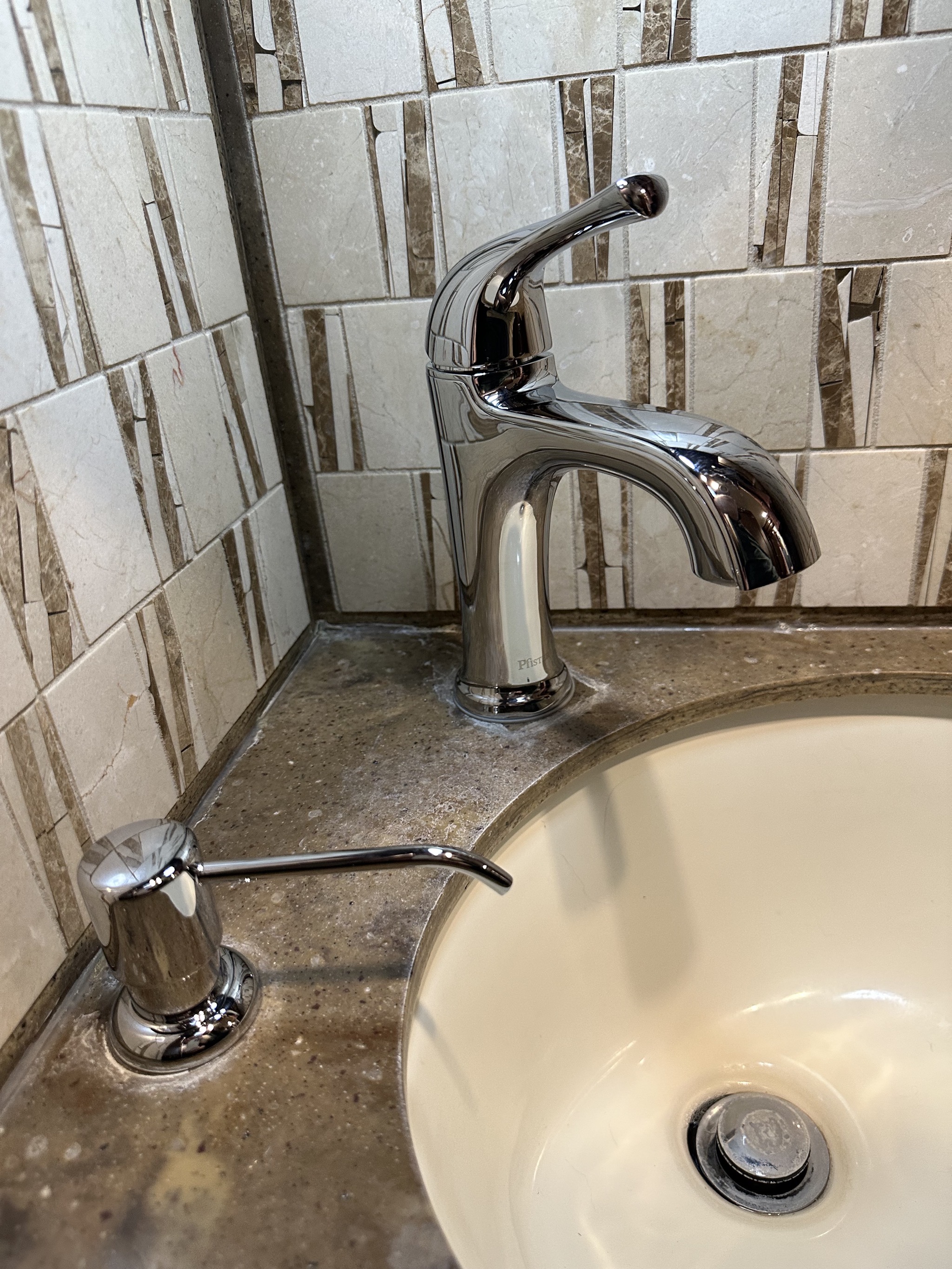 New soap dispenser and faucet in half bath