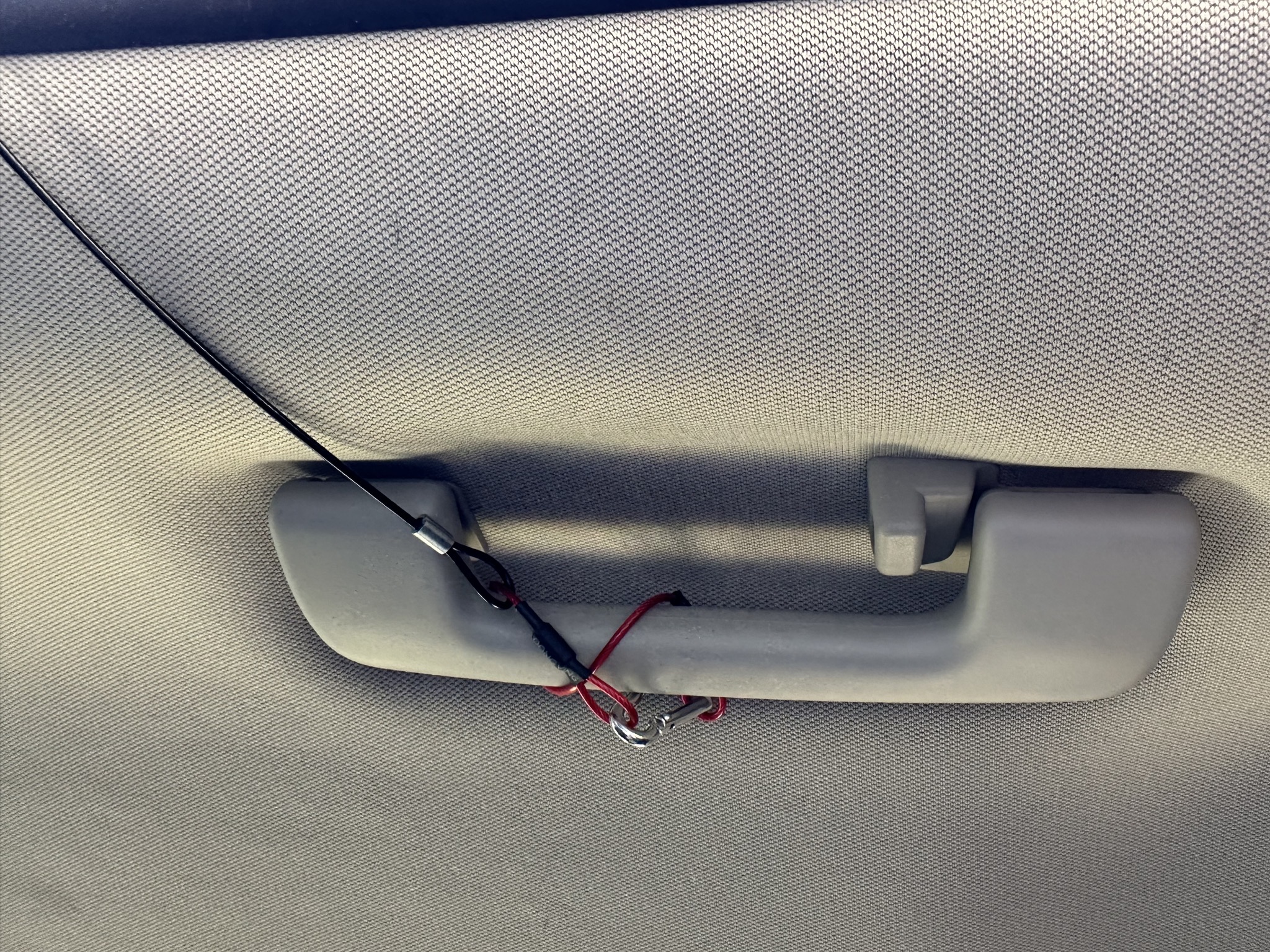 Secured to grab handle