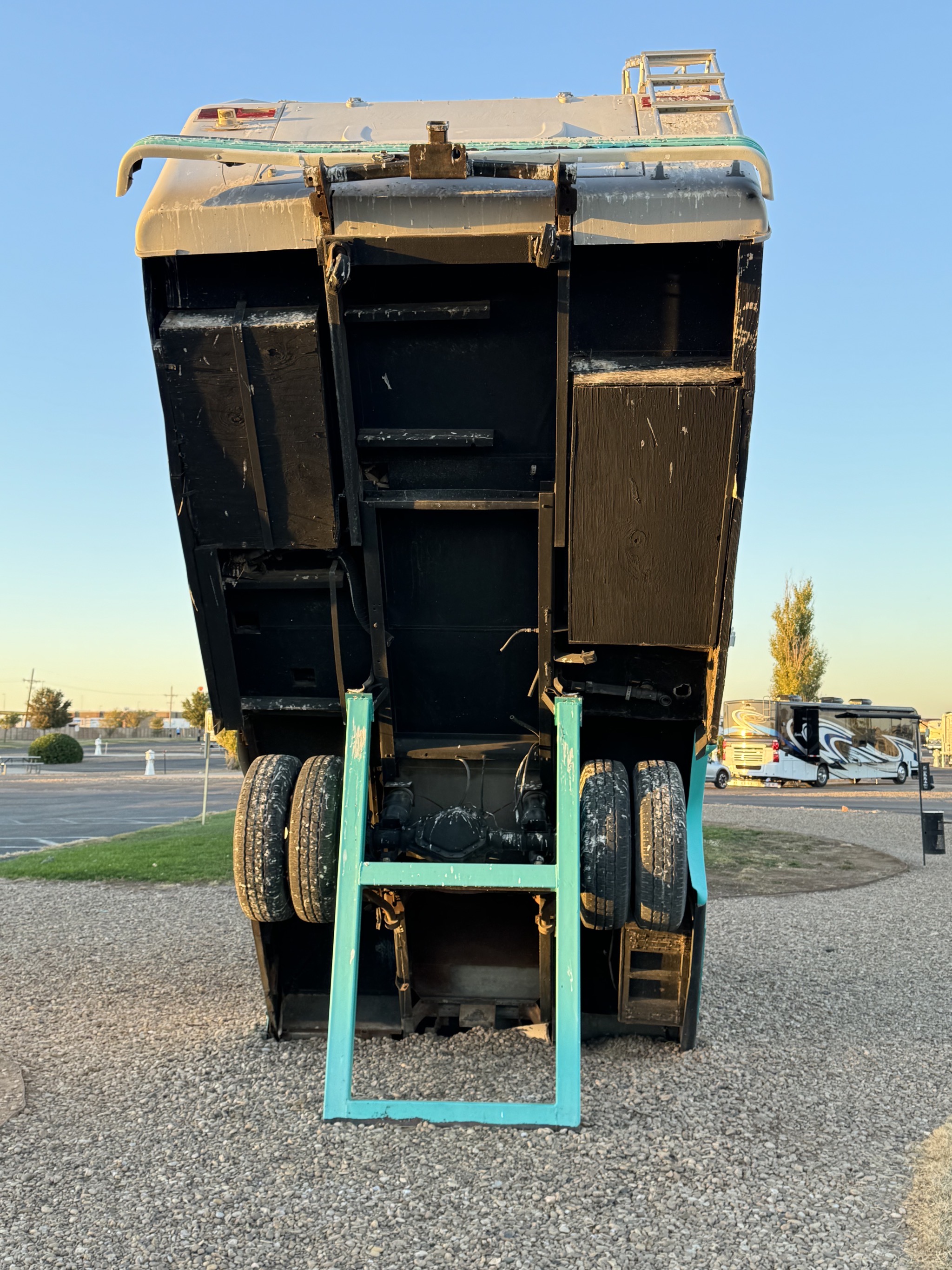 RV in the style of Cadillac Ranch