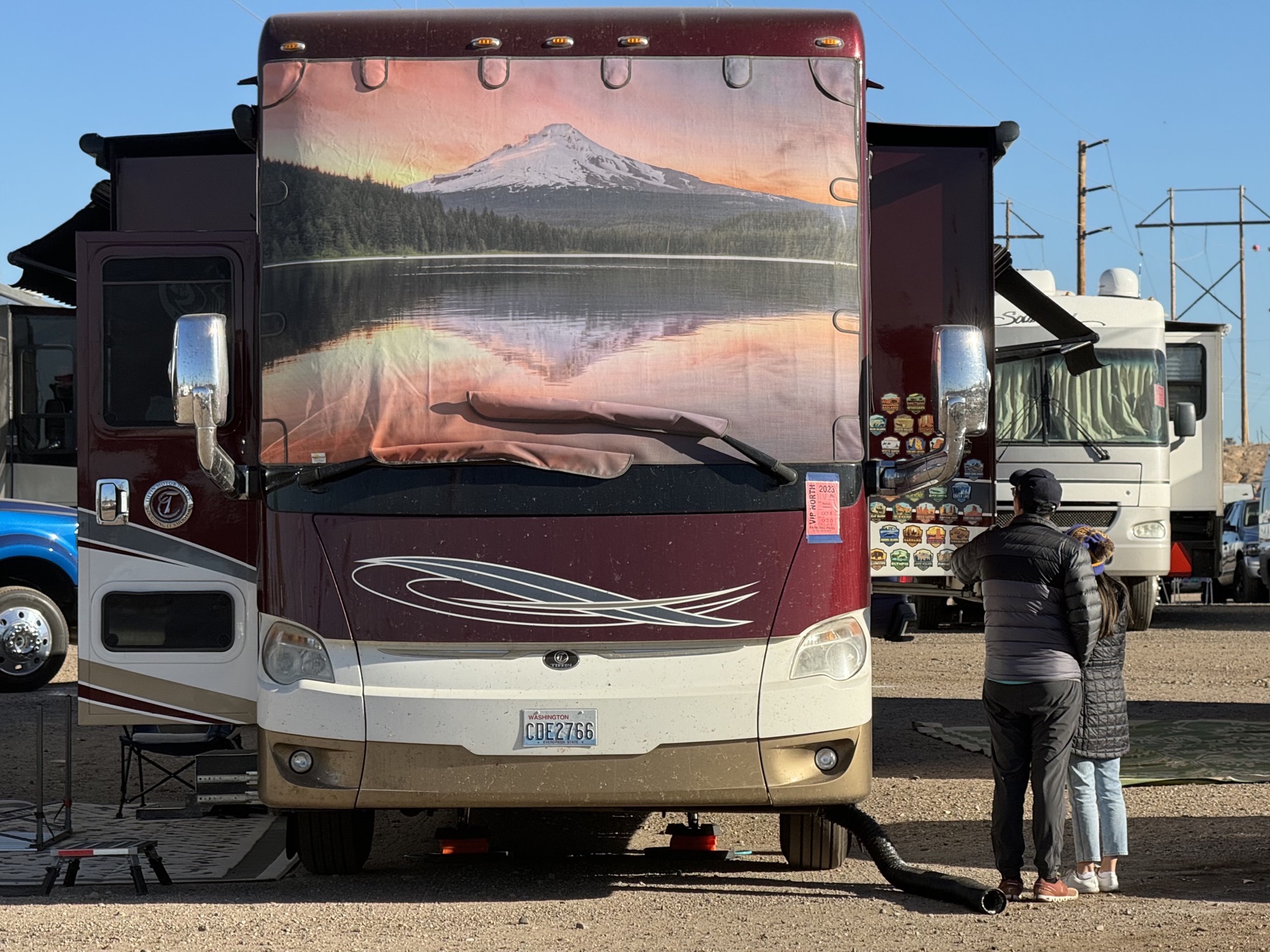 People looking at our National Park stickers