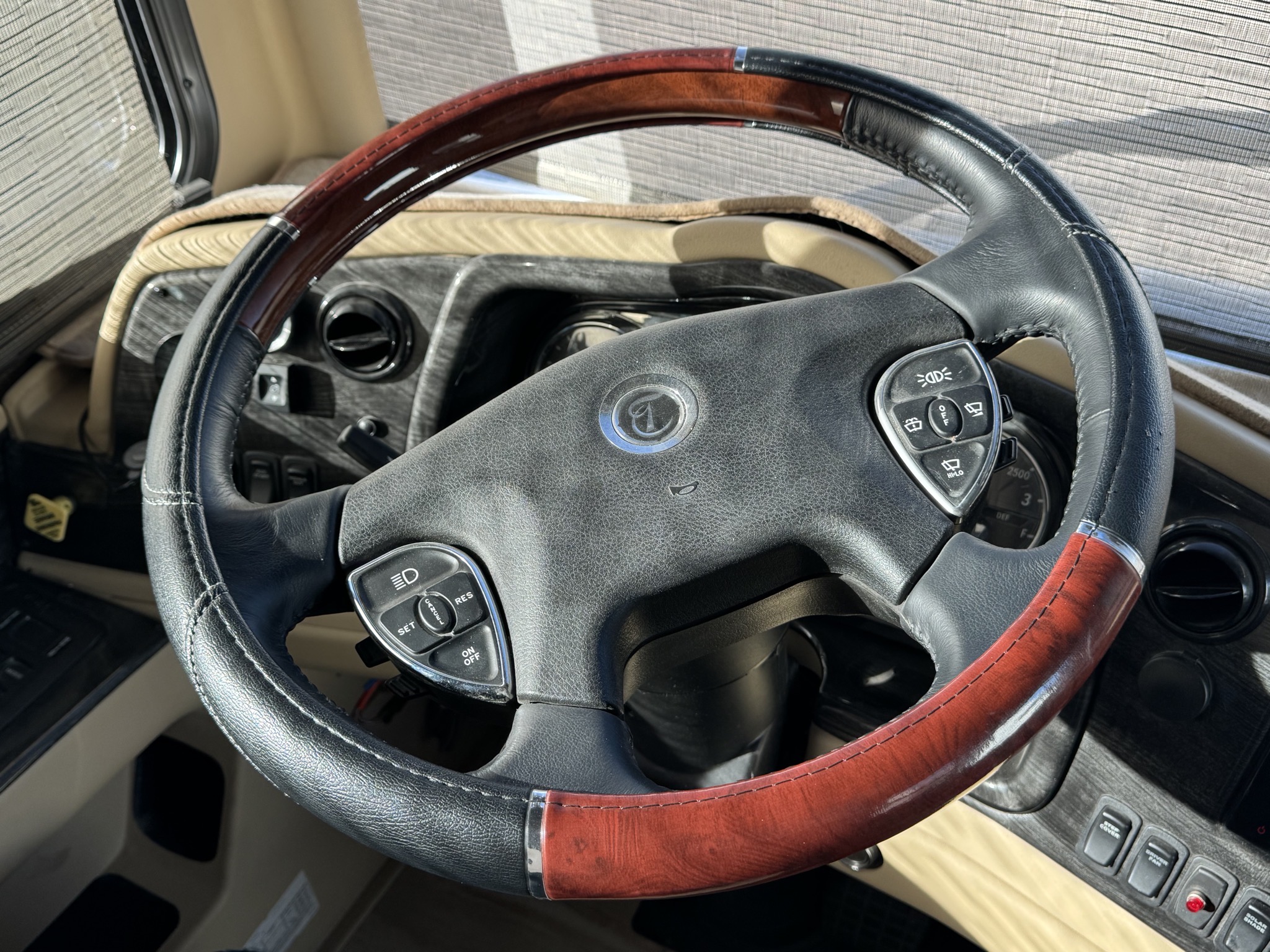 Steering wheel with cover