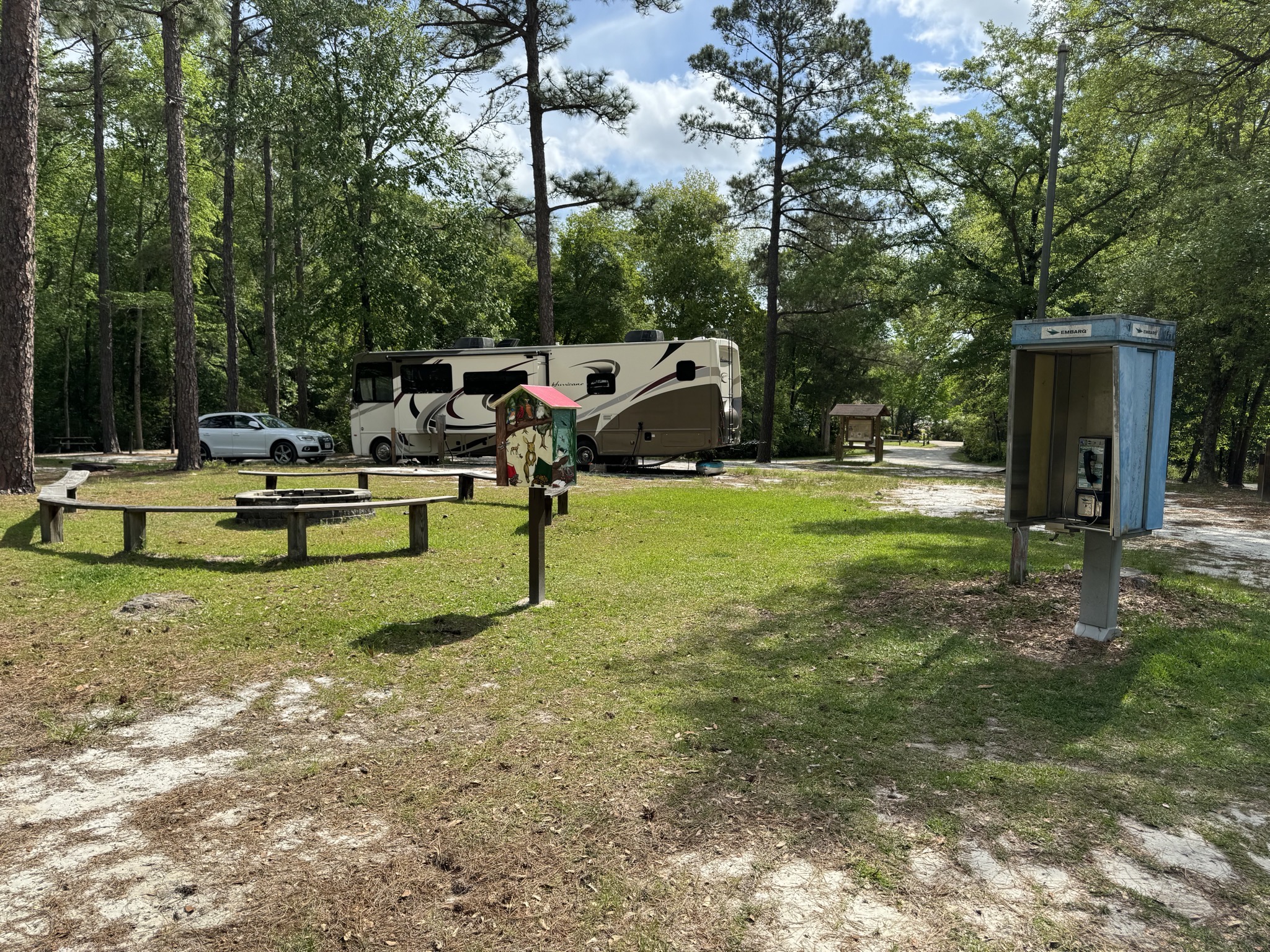 Fire pit, little library, pay phone
