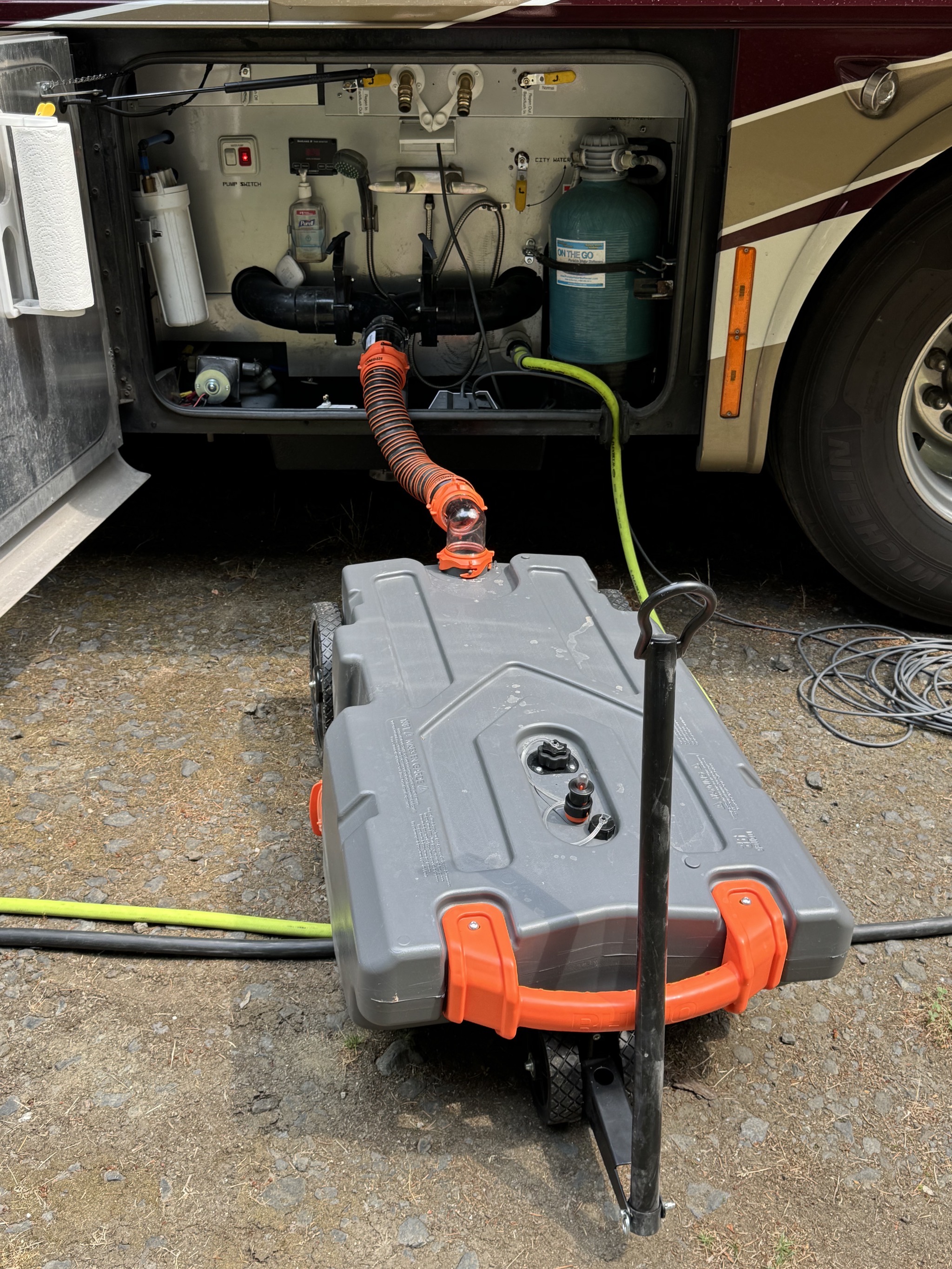 Draining waste tank into tote