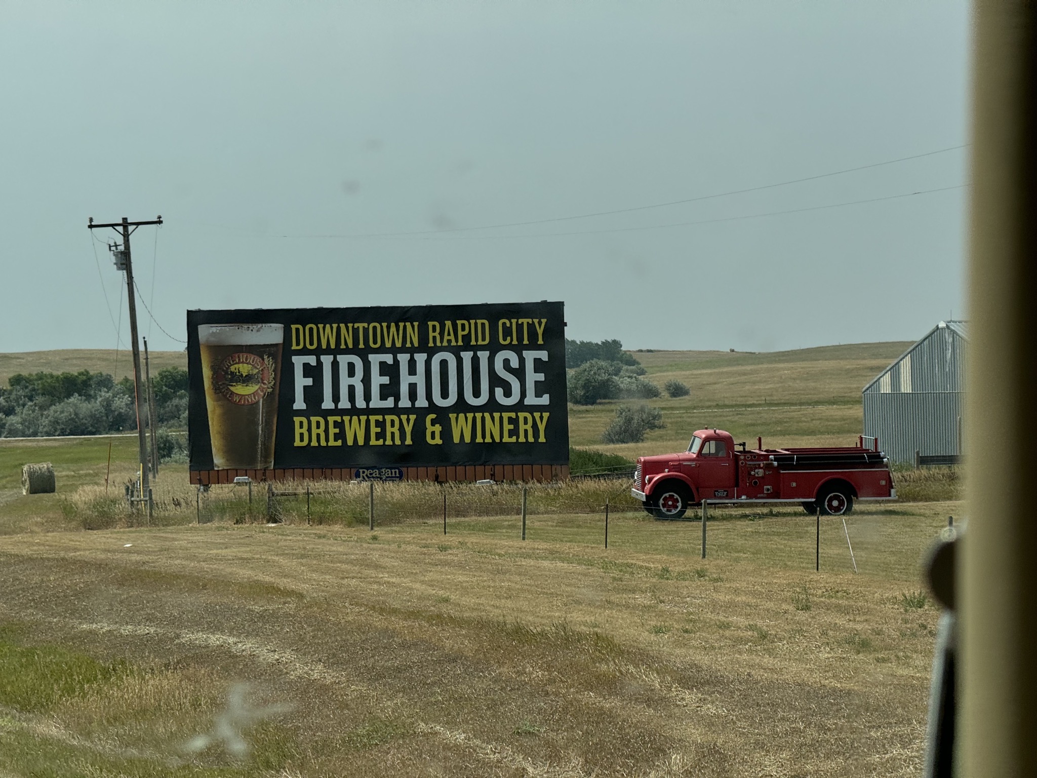 Firehouse Brewery & Winery had several fire trucks along the freeway