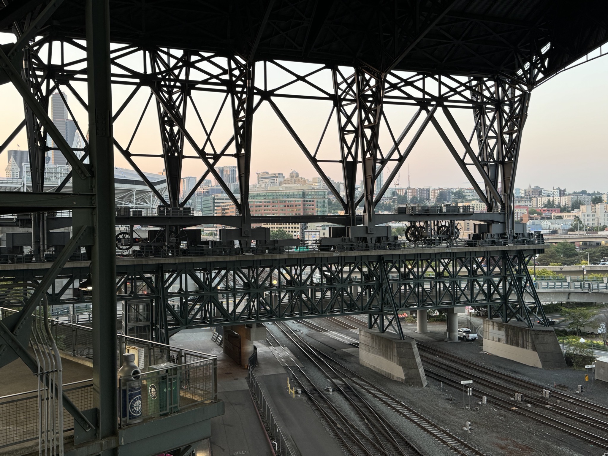 Retractable roof over train tracks