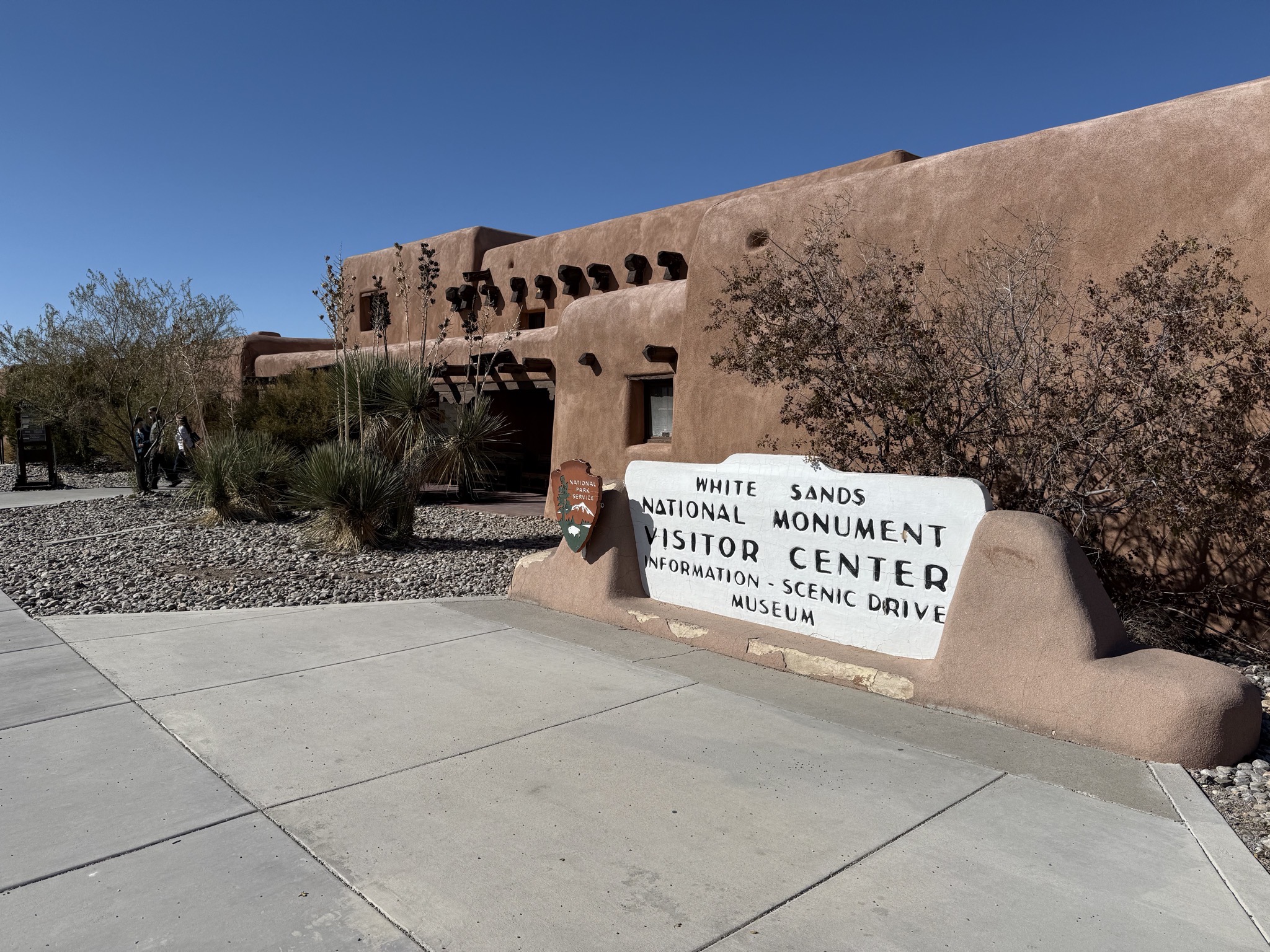 Visitor Center with historic sign from before it became a National Park
