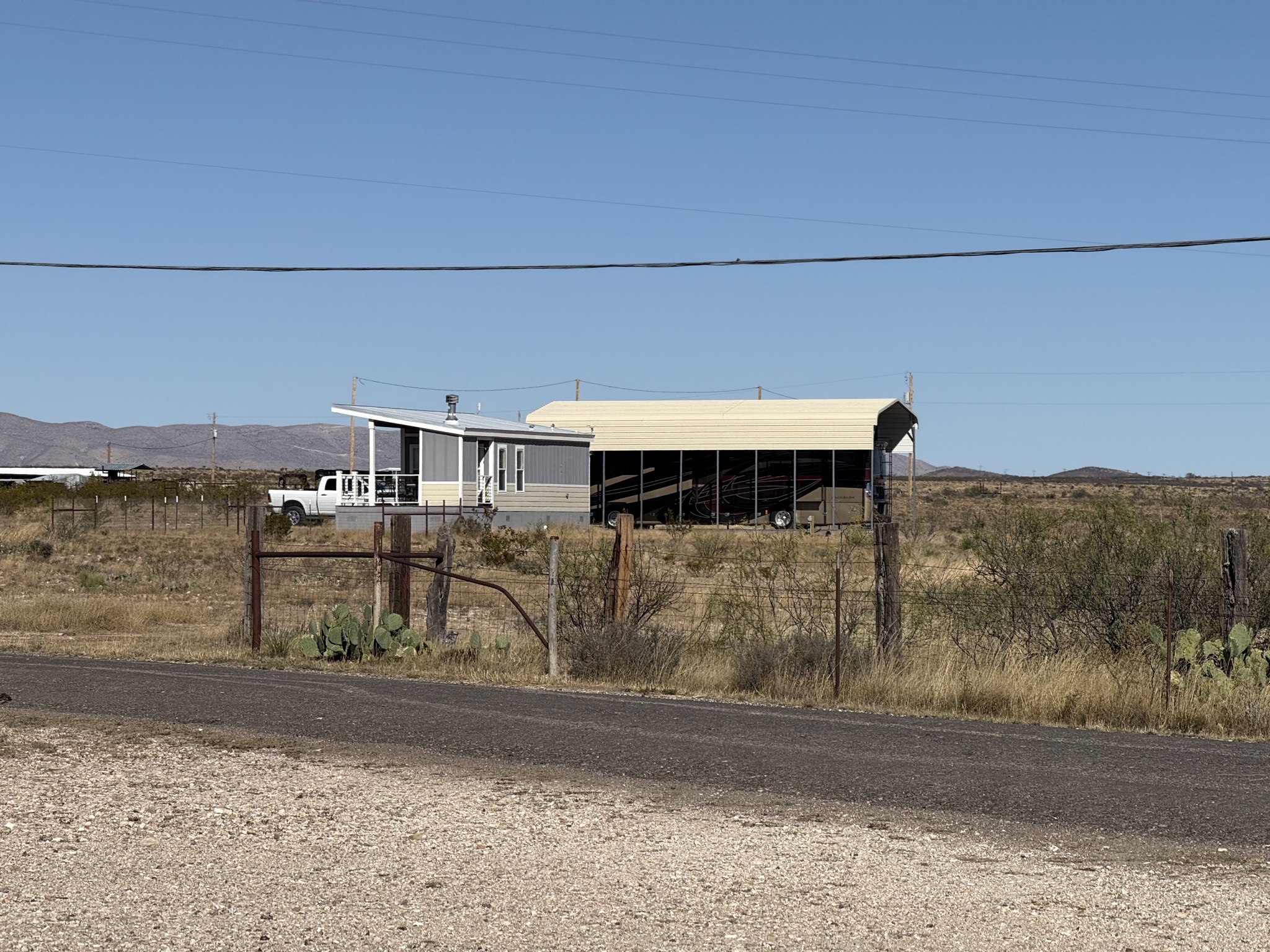 Tiny home and covered RV across the road