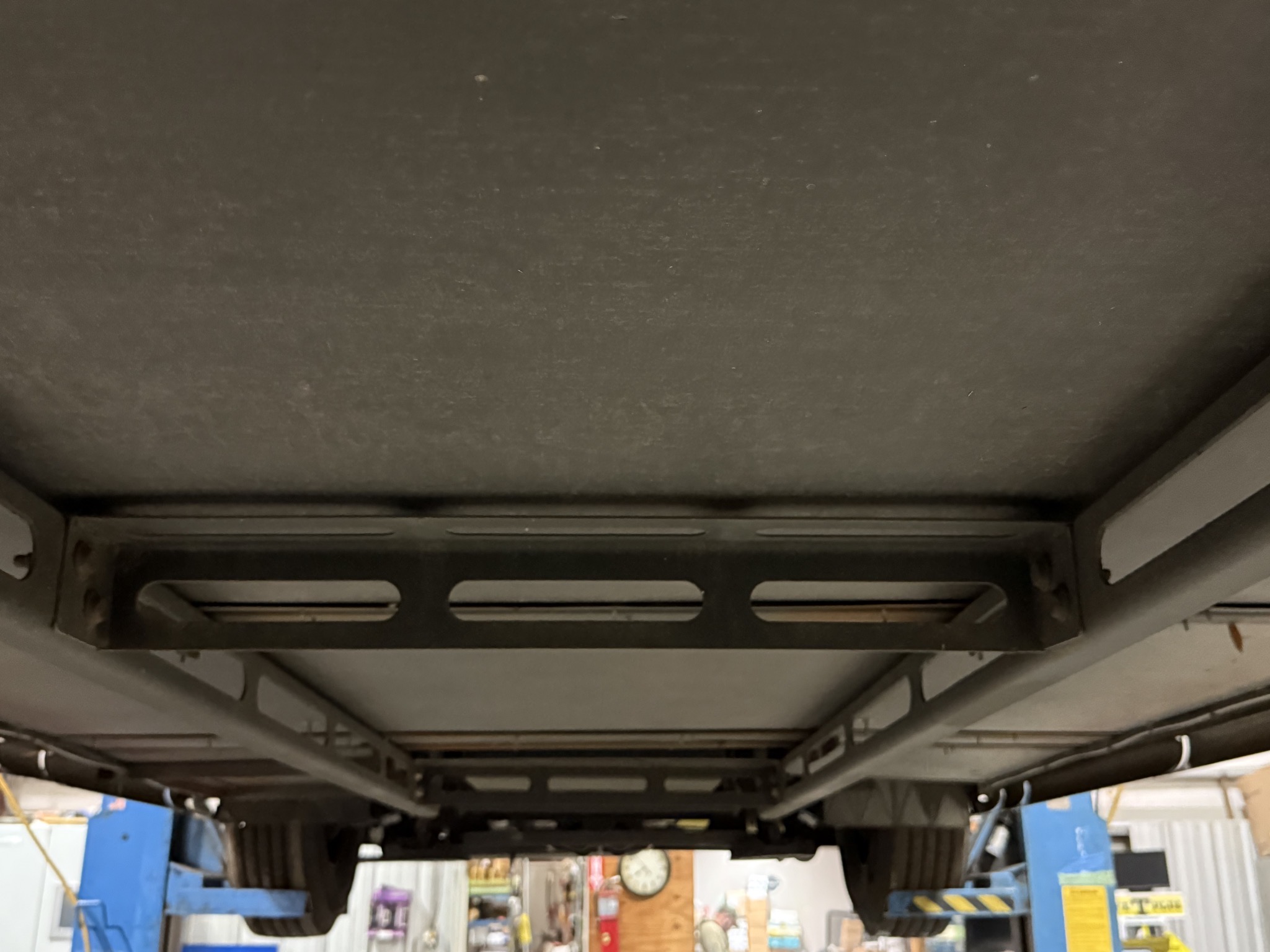 Under basement storage bays