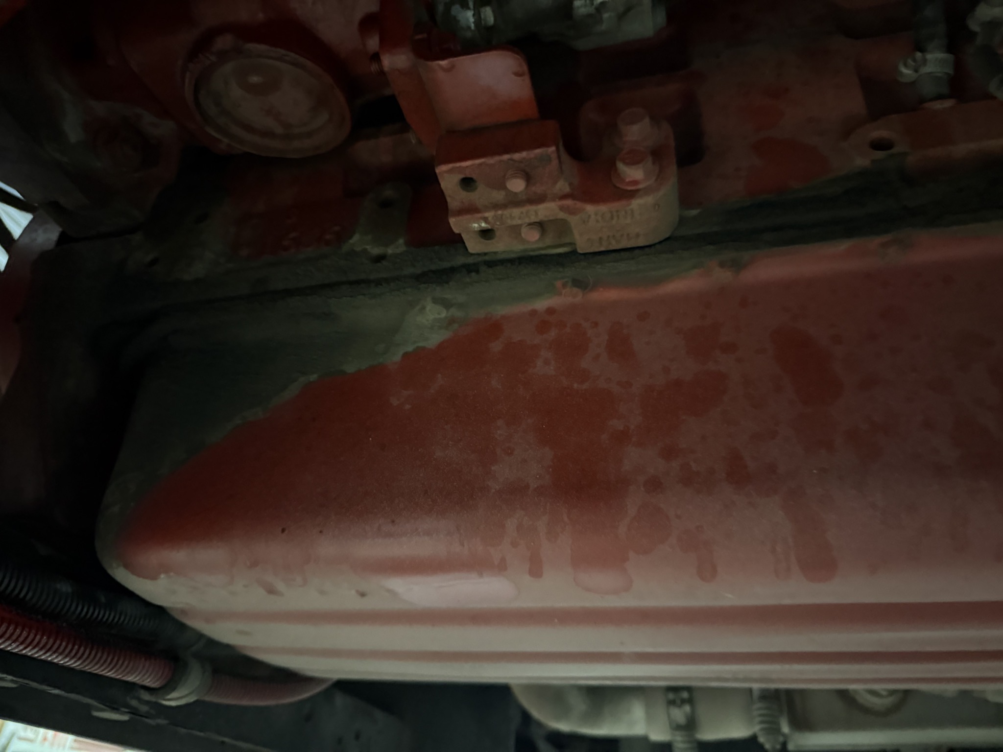 Oil pan, with a non-concerning minor leak